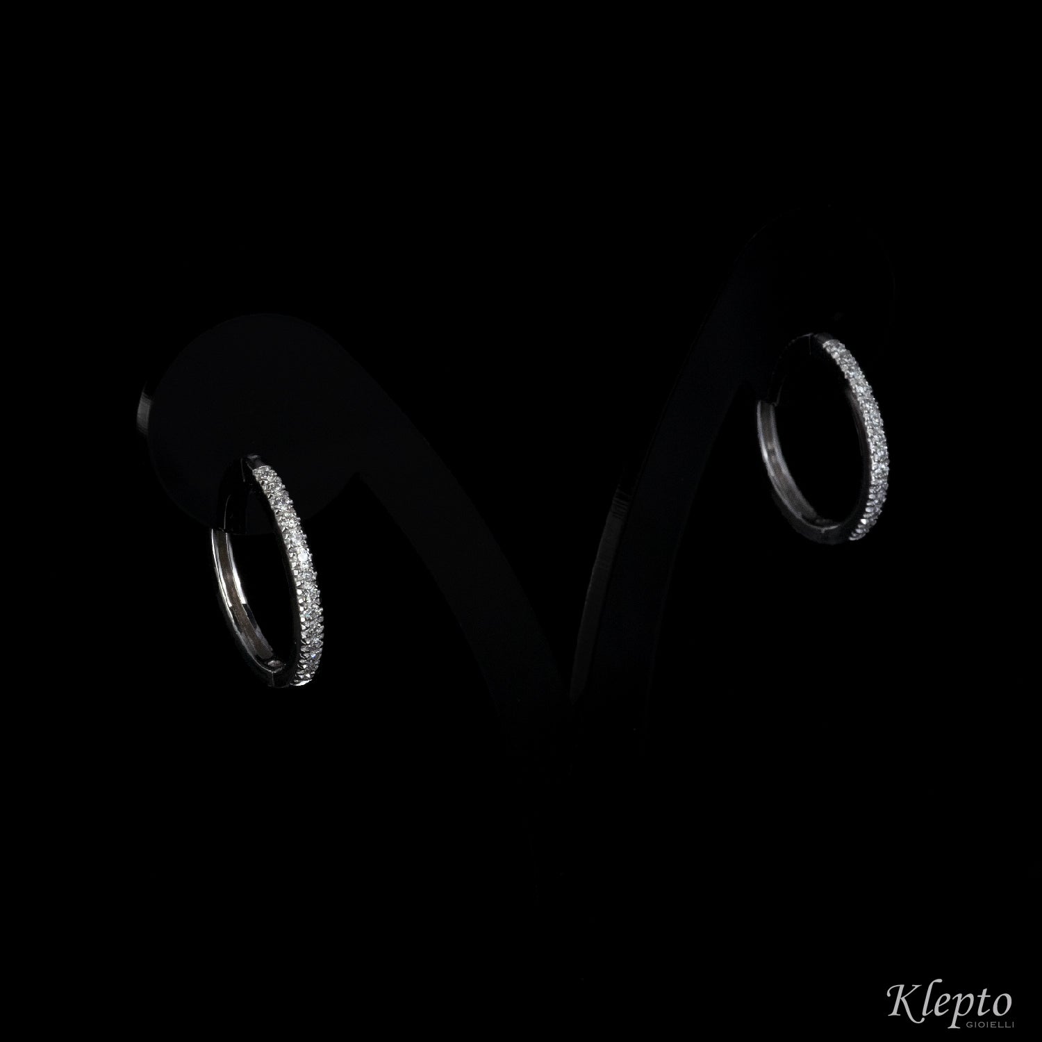White gold hoop earrings with diamonds
