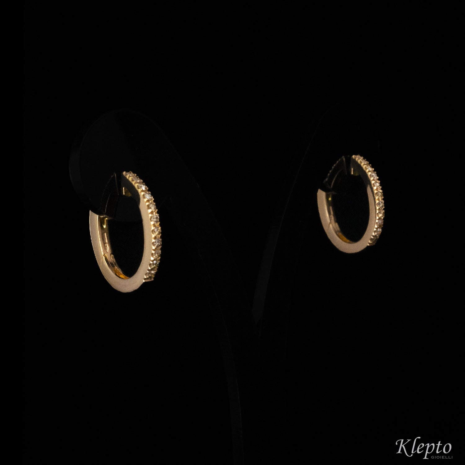 Rose gold hoop earrings with brown diamonds