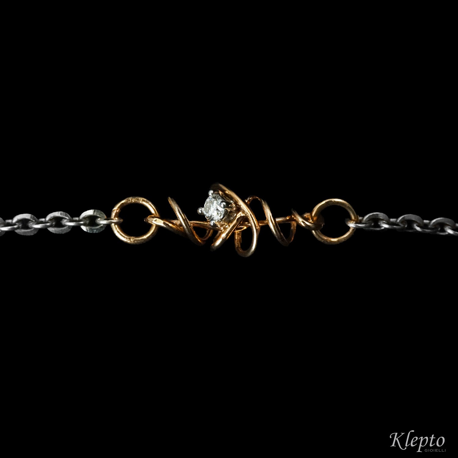 White gold bracelet with Diamond and rose gold knot