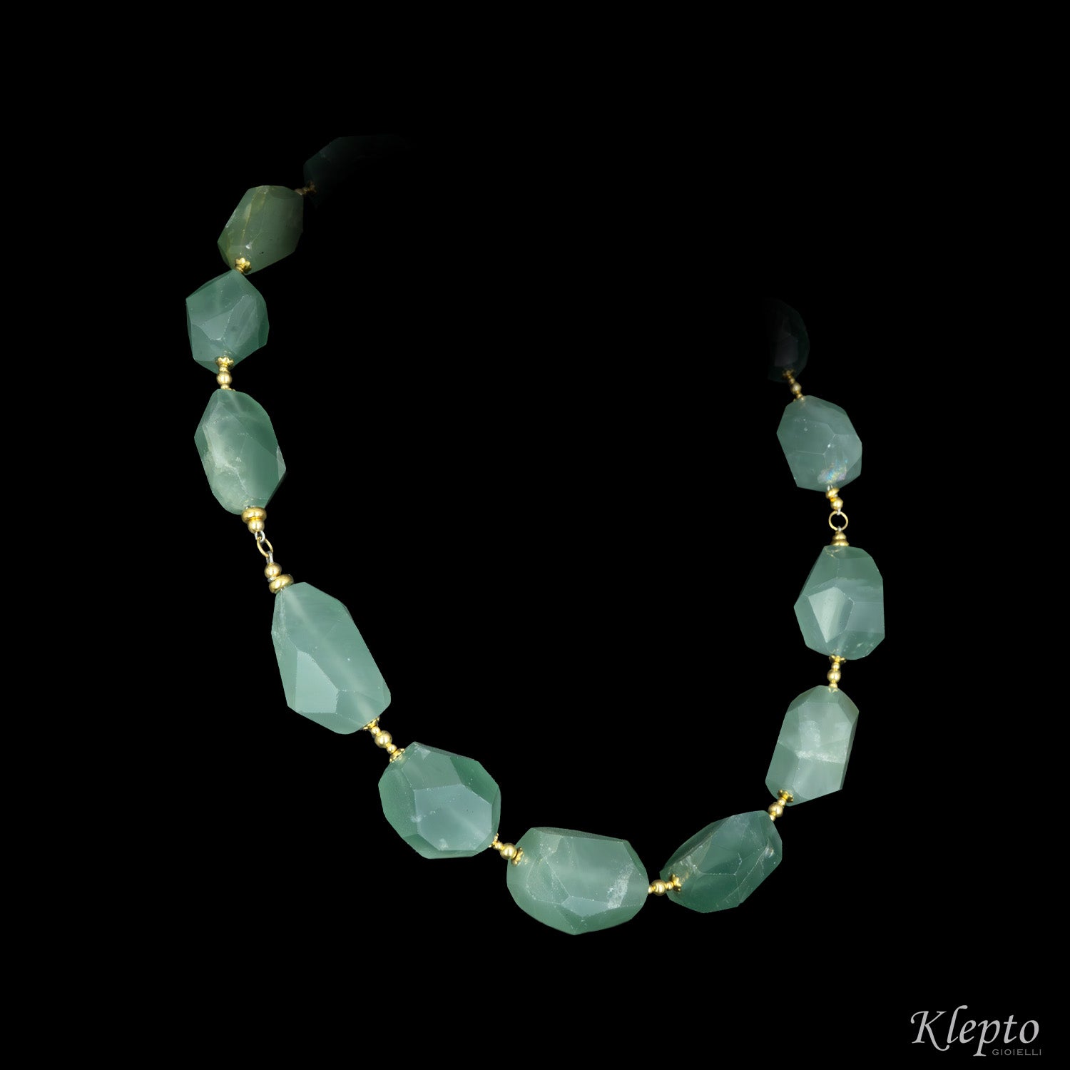Yellow gold necklace with rough aquamarine