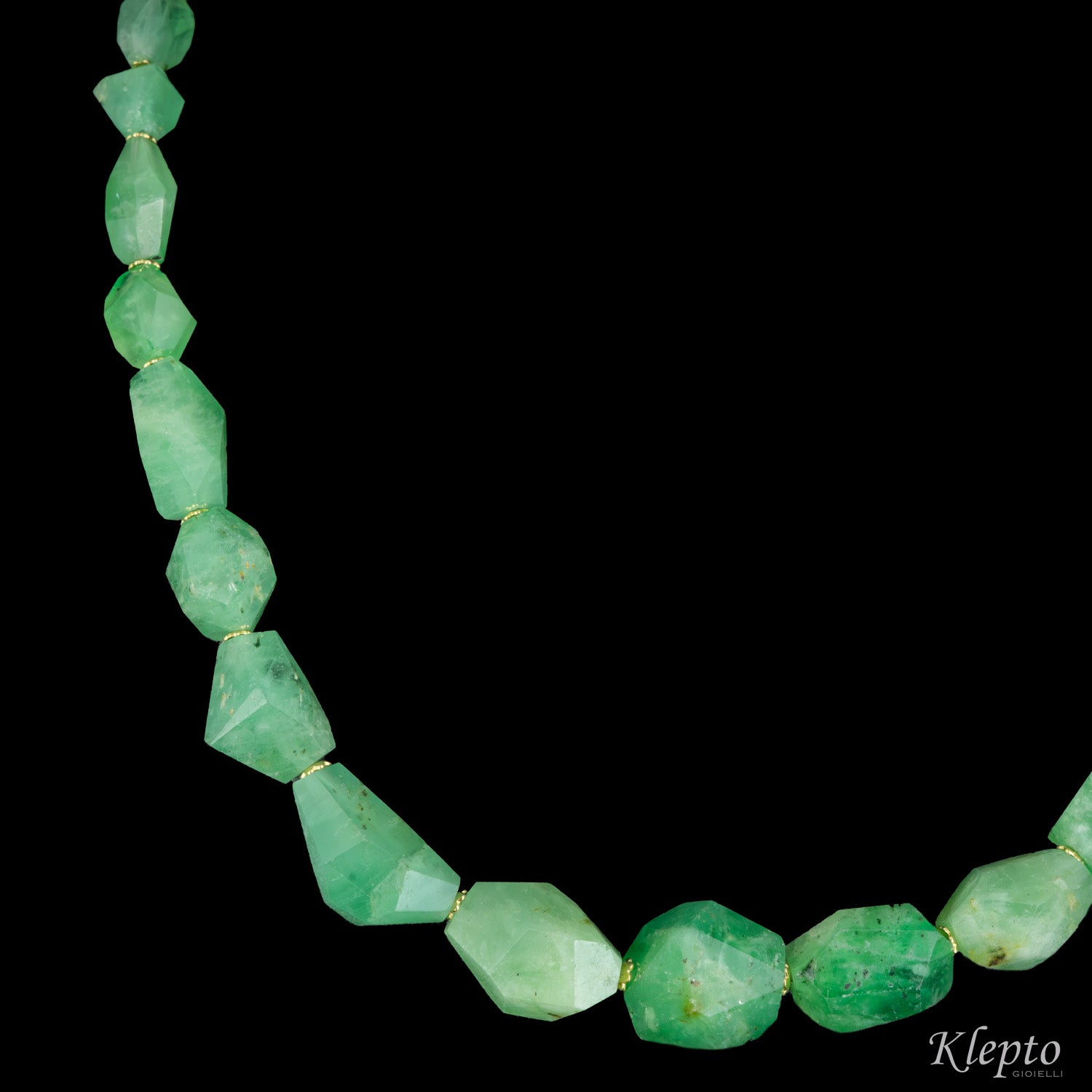 Yellow gold necklace with raw emeralds