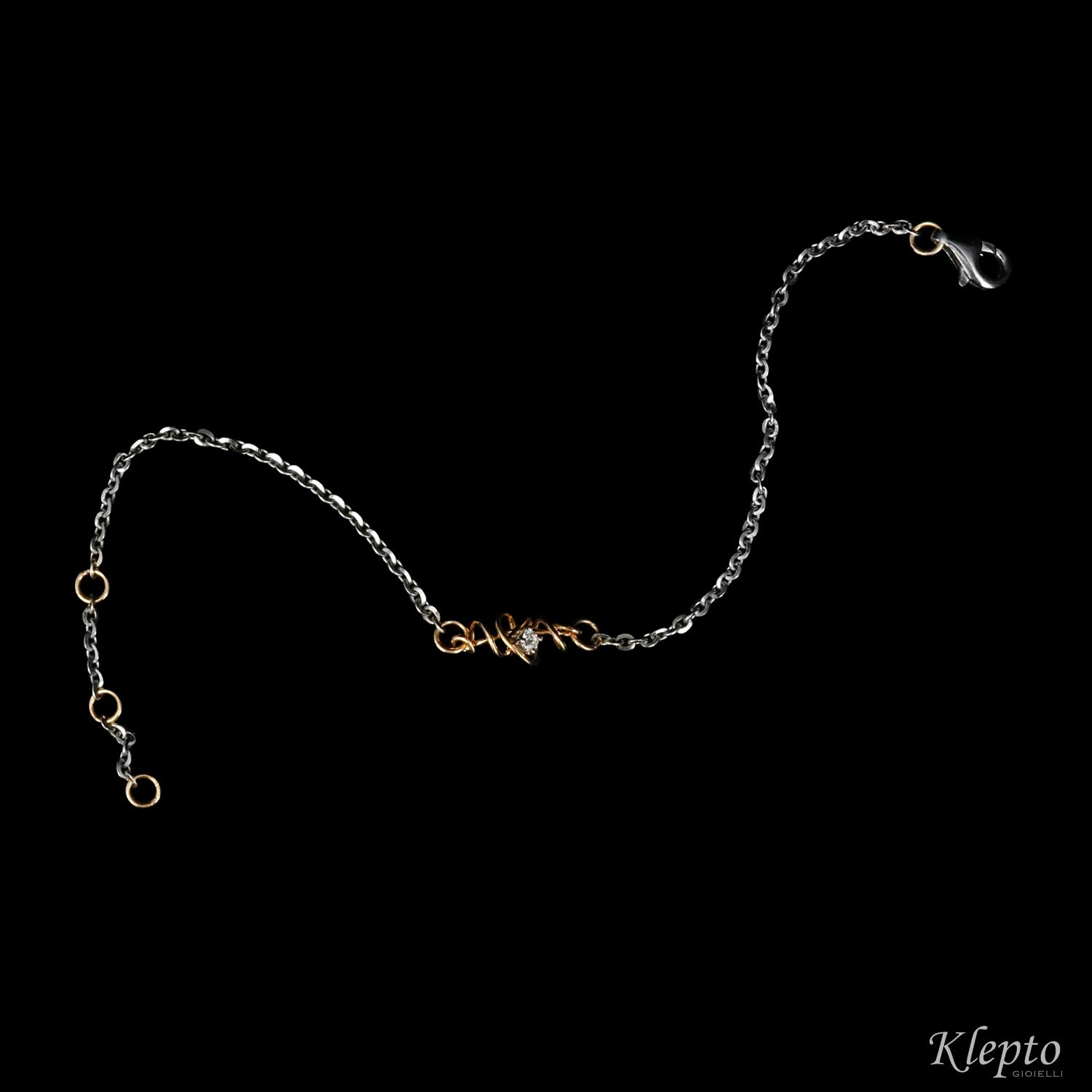 White gold bracelet with Diamond and rose gold knot
