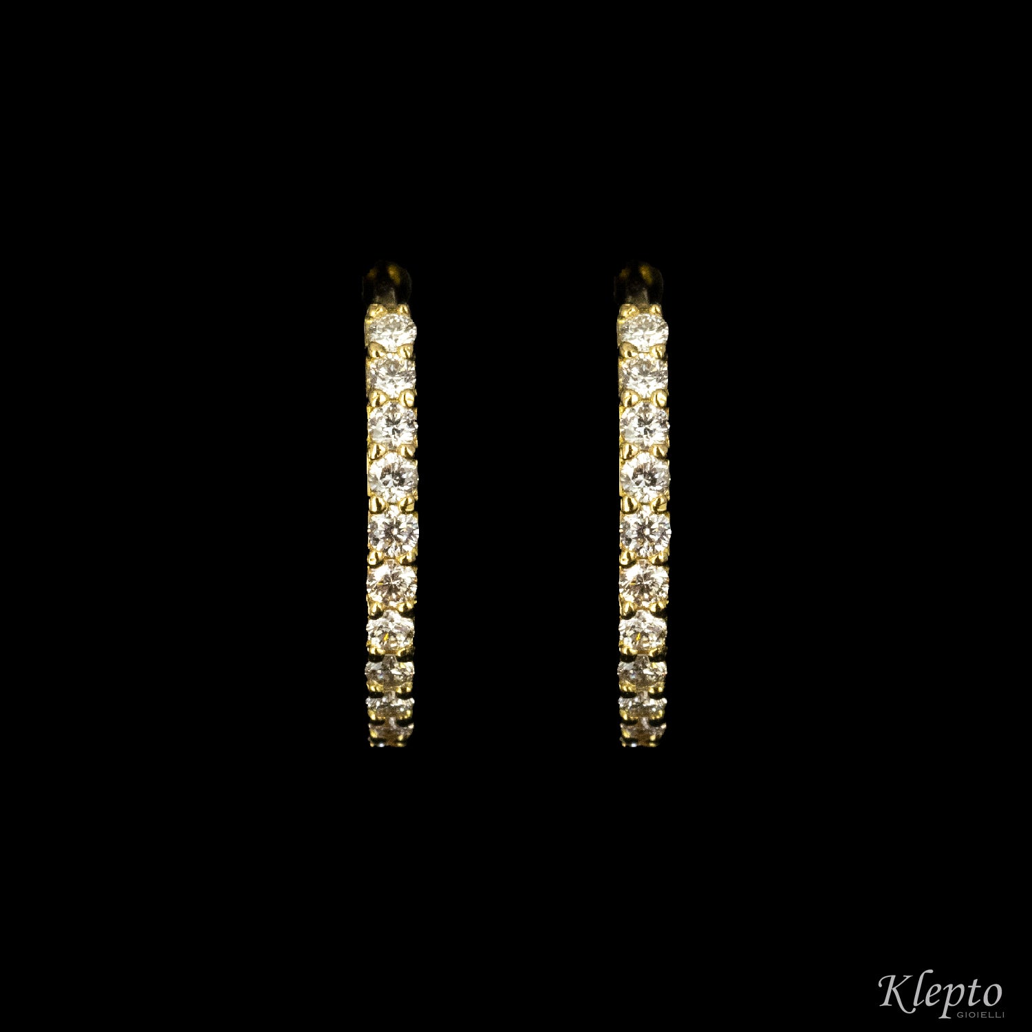 Yellow gold hoop earrings with diamonds