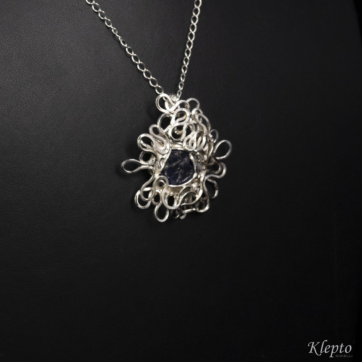 Pendant in Silnova® Silver flush with raw Sapphire