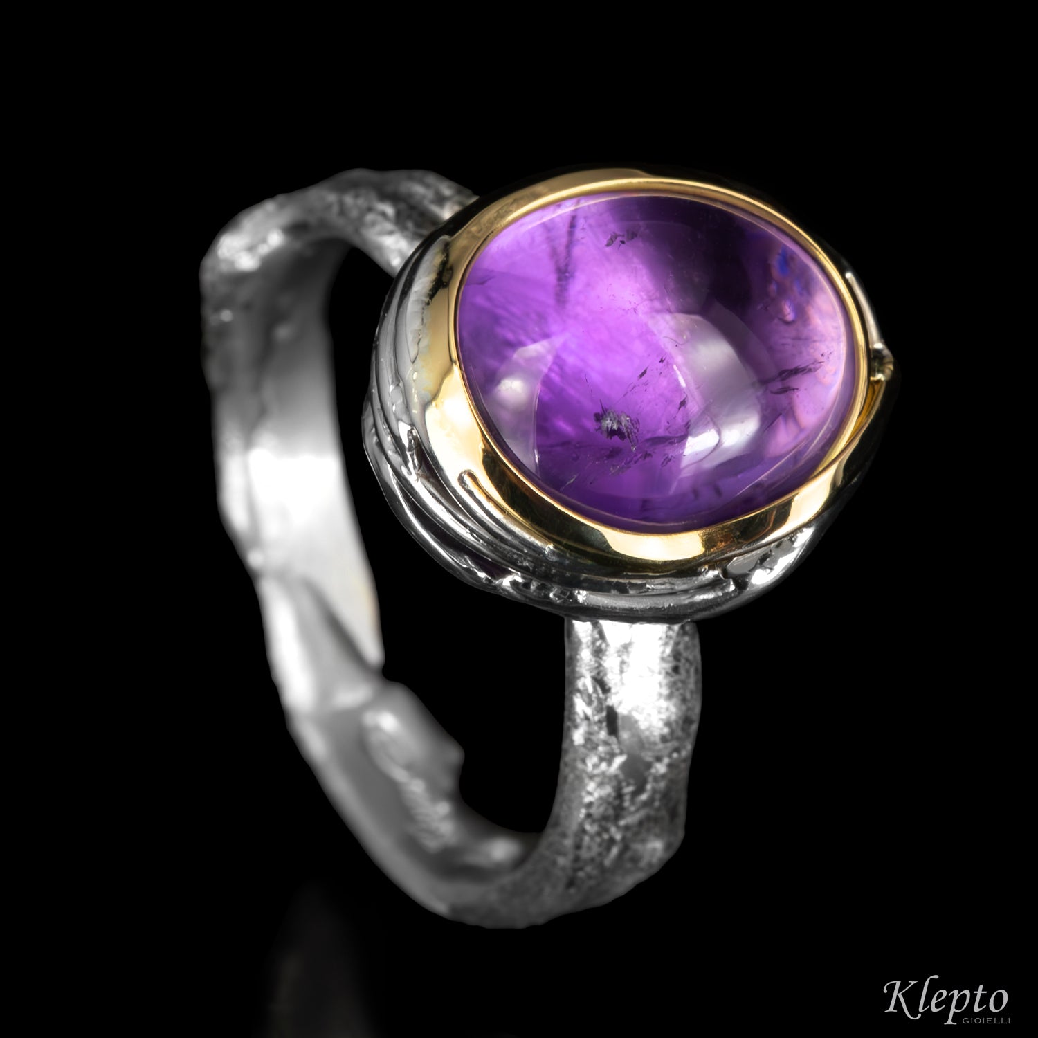 Silnova® Silver Ring "Bumba" with Cabochon Amethyst and Yellow Gold Details