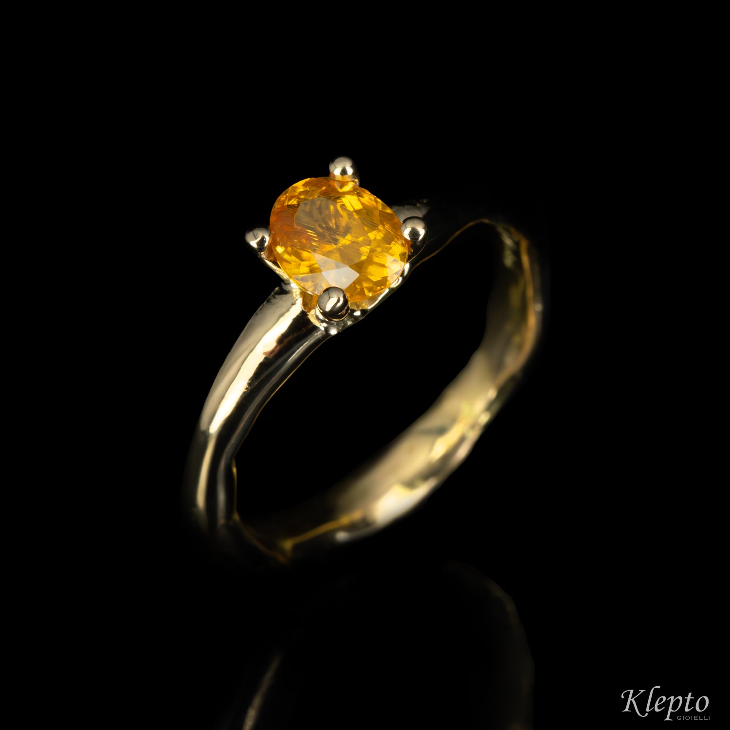 Yellow gold ring "Divenire" with natural yellow zircon