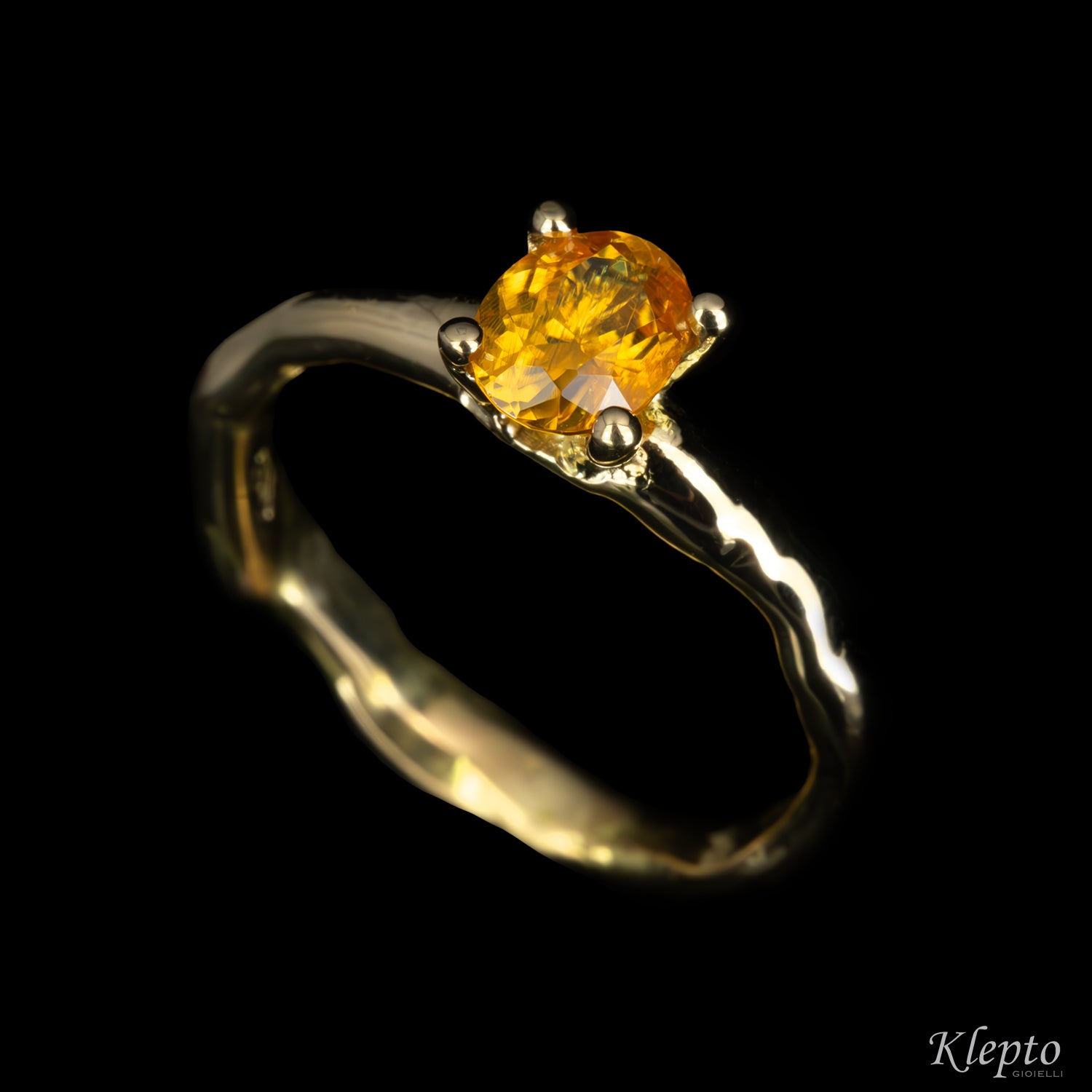 Yellow gold ring "Divenire" with natural yellow zircon