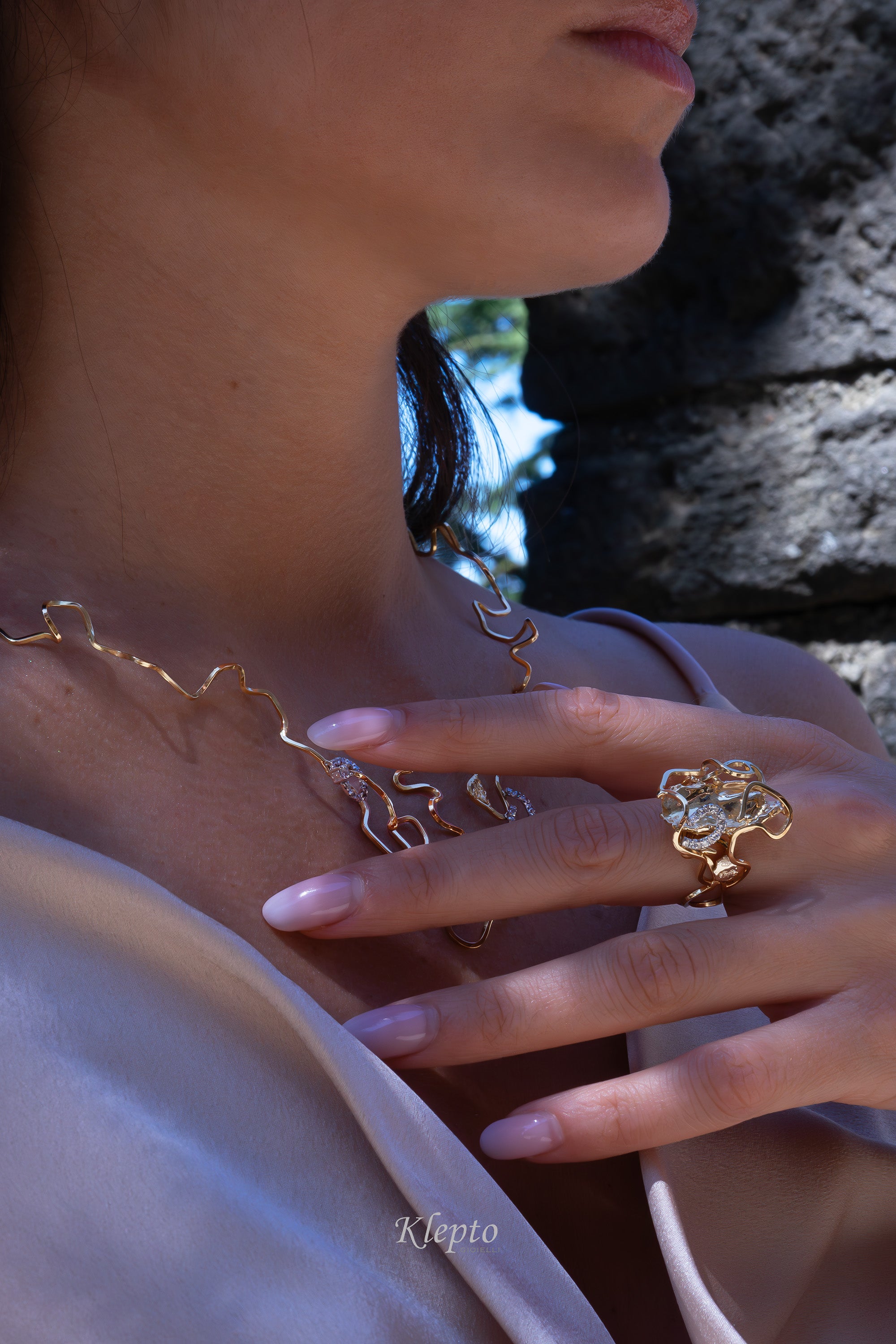 "EleKtro" yellow and white gold ring with diamonds