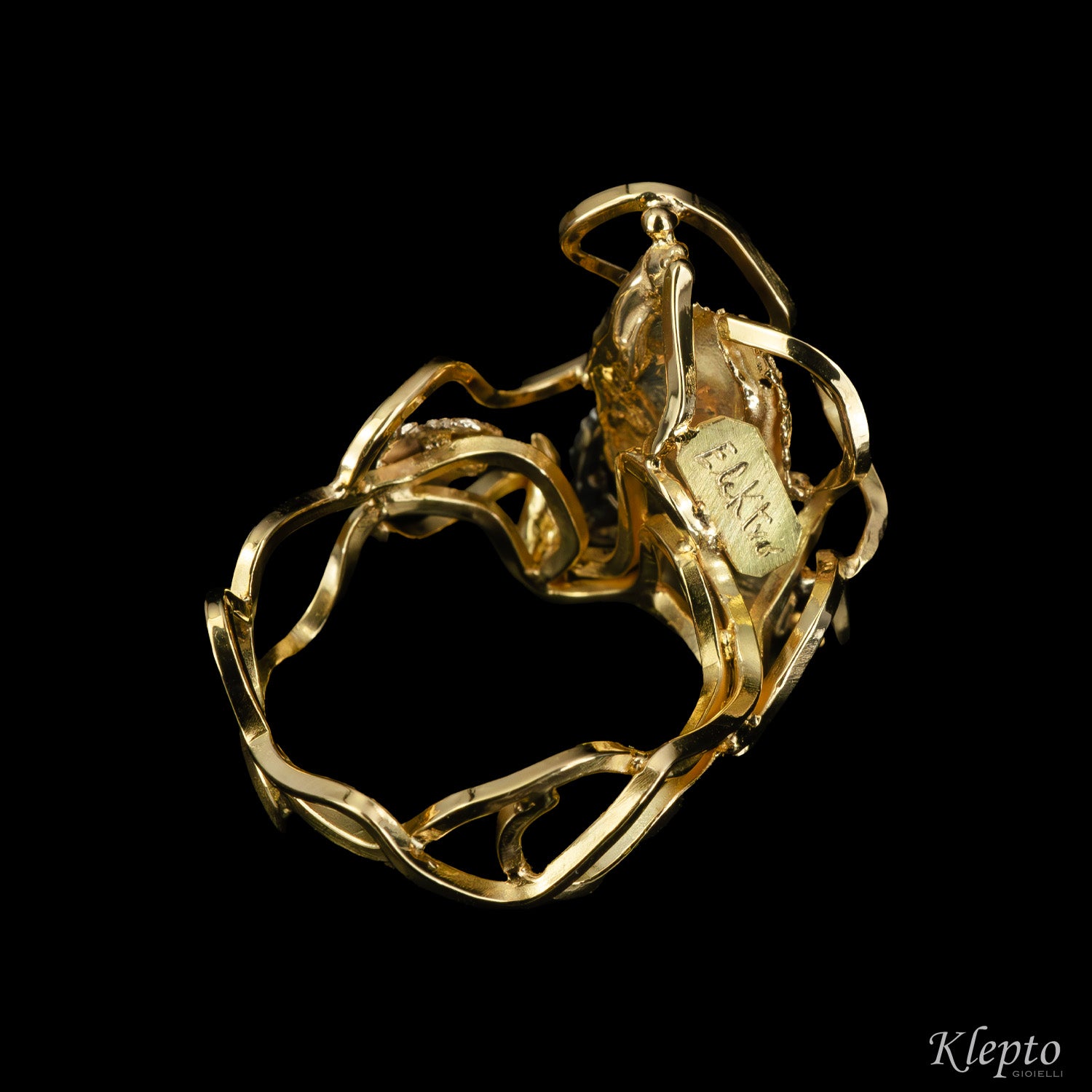 "EleKtro" yellow and white gold ring with diamonds