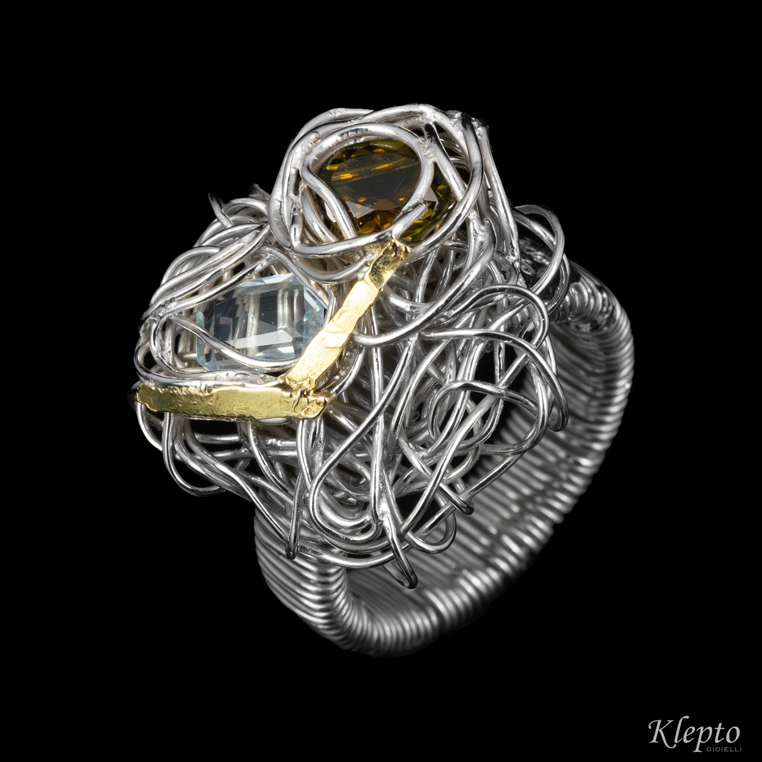 Silnova® silver wire ring with green tourmaline, aquamarine and yellow gold details
