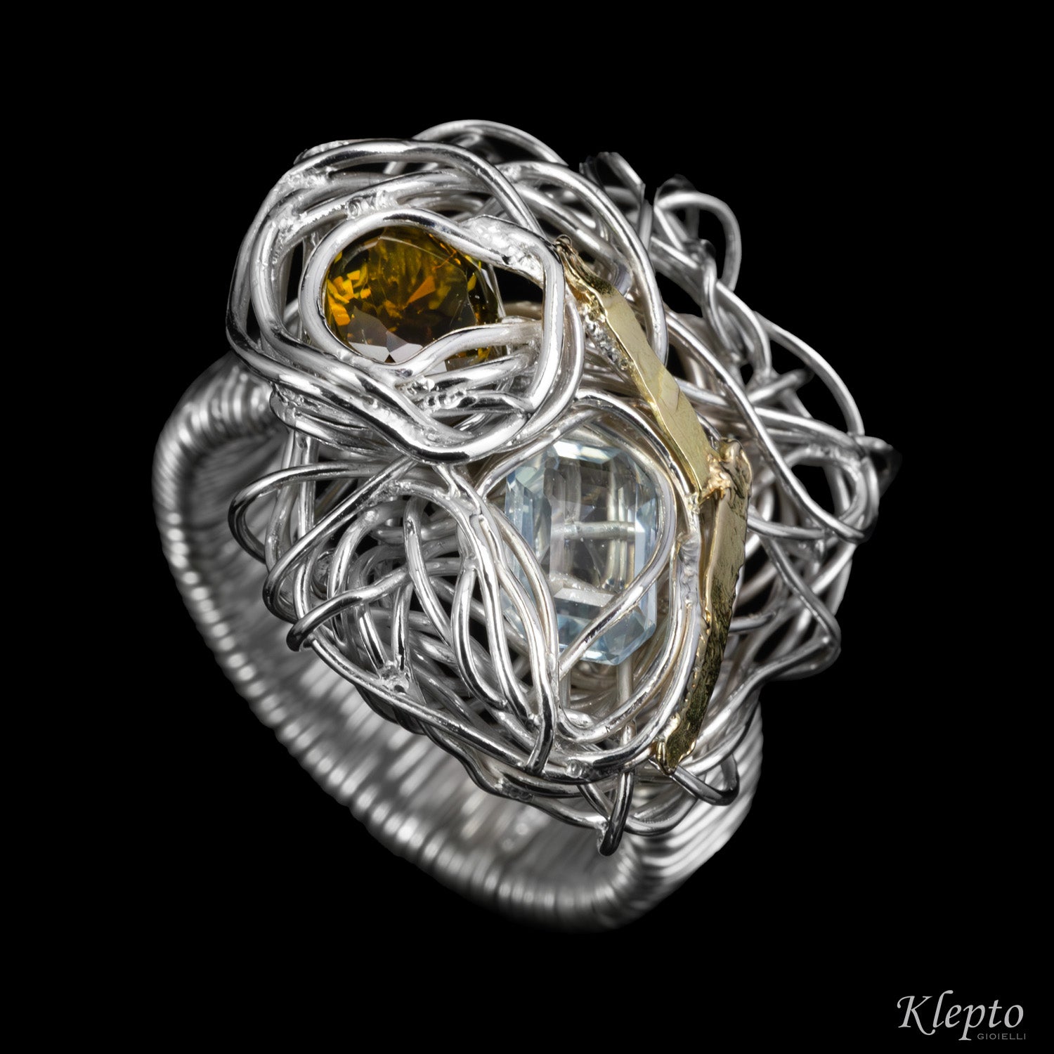Silnova® silver wire ring with green tourmaline, aquamarine and yellow gold details