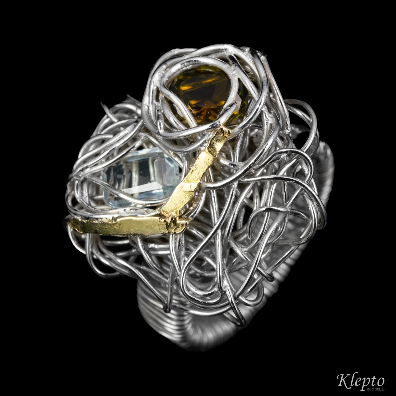Silnova® silver wire ring with green tourmaline, aquamarine and yellow gold details
