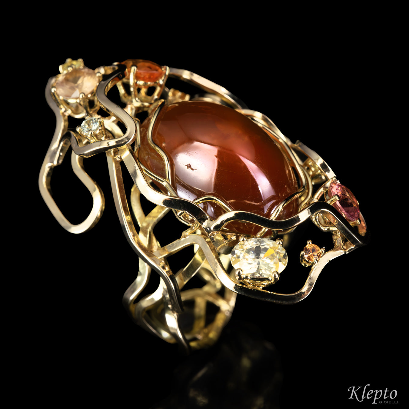 Yellow gold ring "Origins" with Spessartite, Sapphires, Zircons, and Garnet fanta