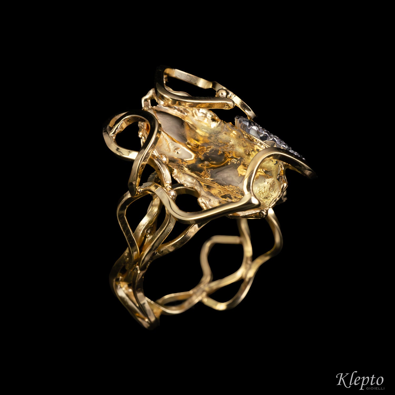 "EleKtro" yellow and white gold ring with diamonds