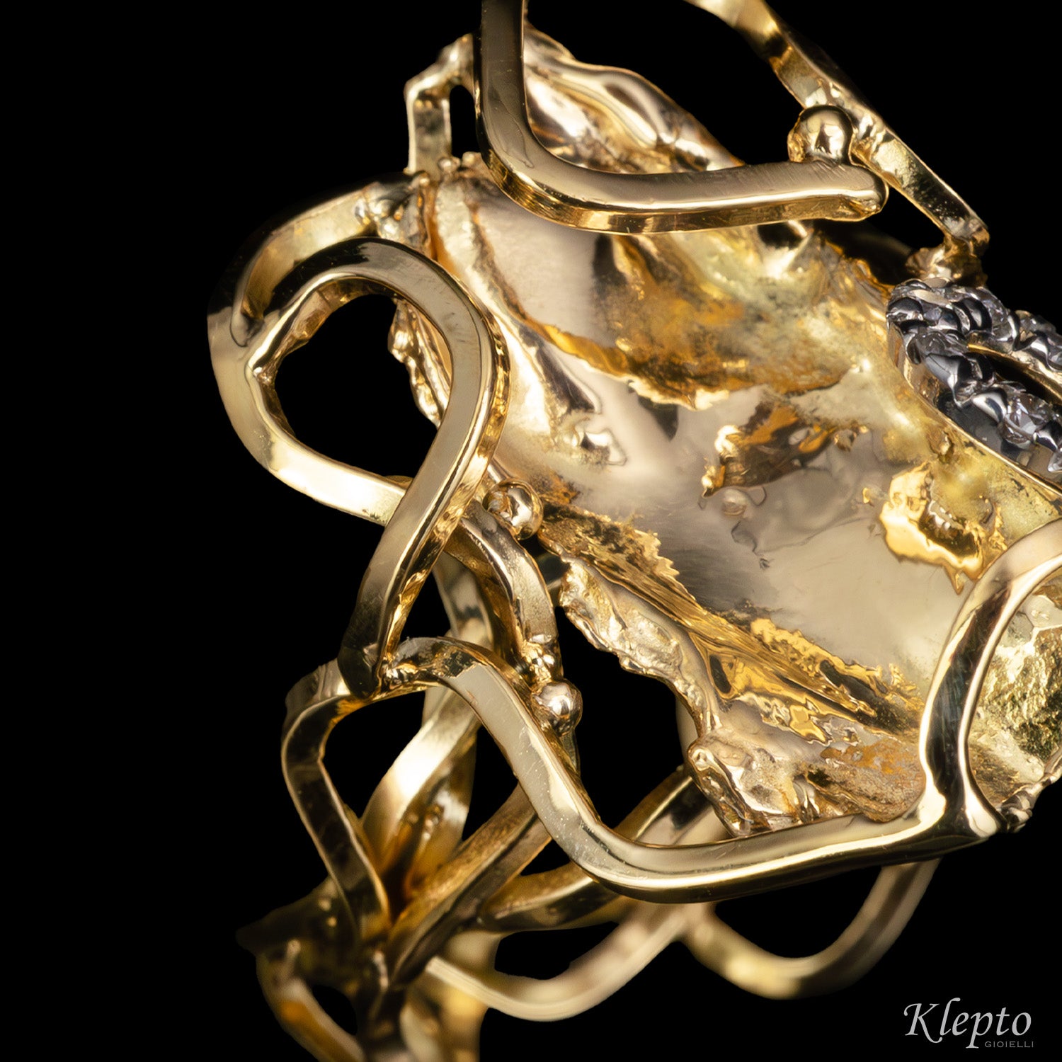 "EleKtro" yellow and white gold ring with diamonds