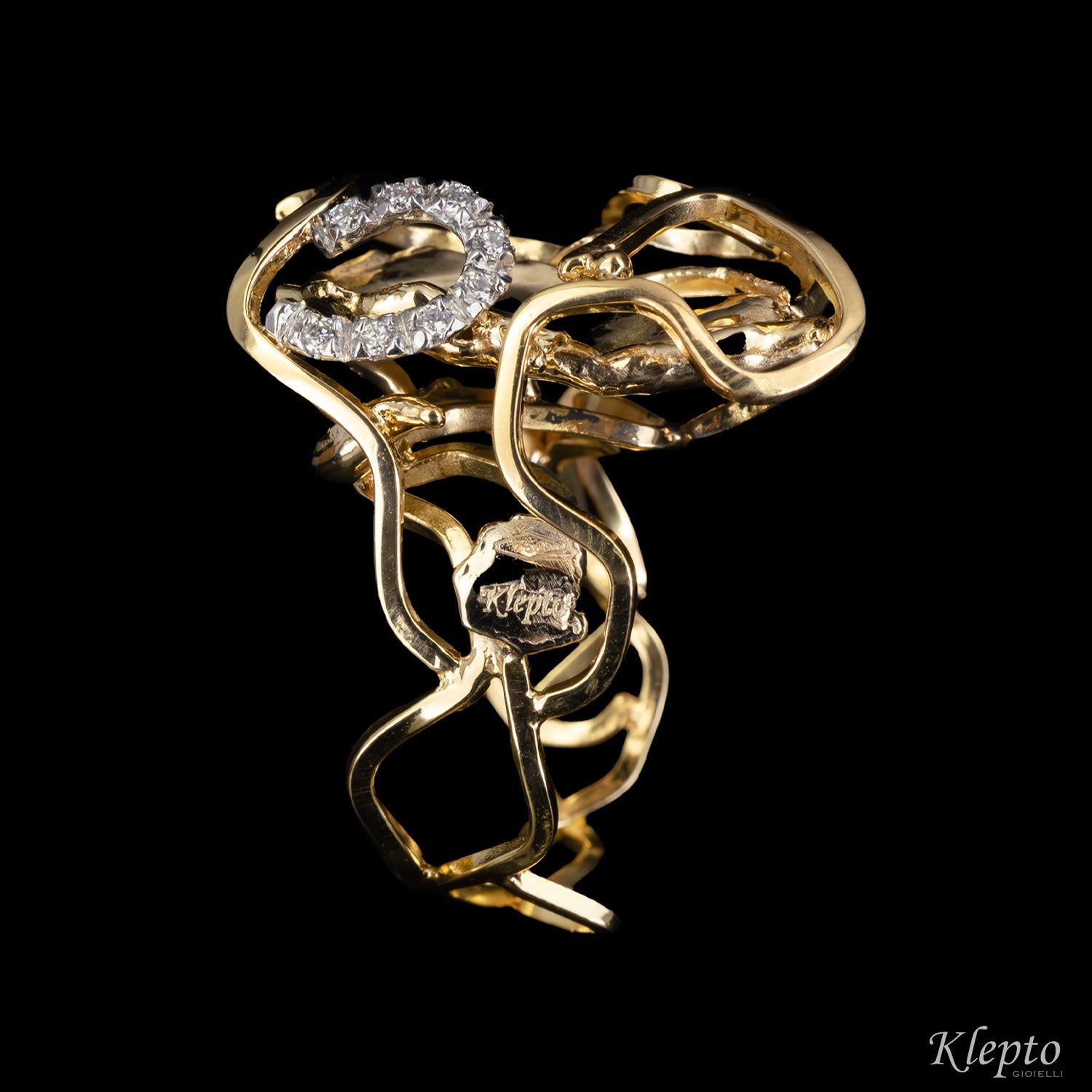"EleKtro" yellow and white gold ring with diamonds