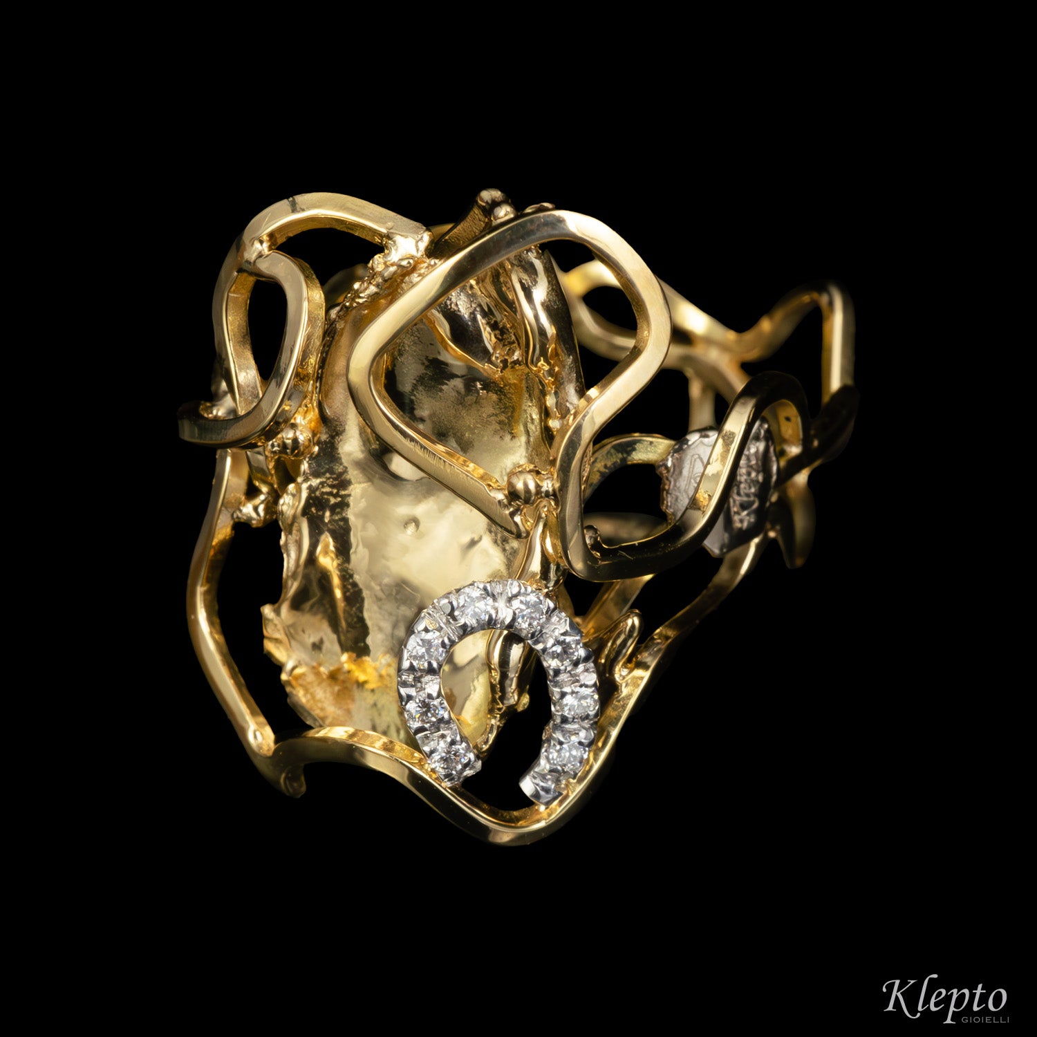 "EleKtro" yellow and white gold ring with diamonds