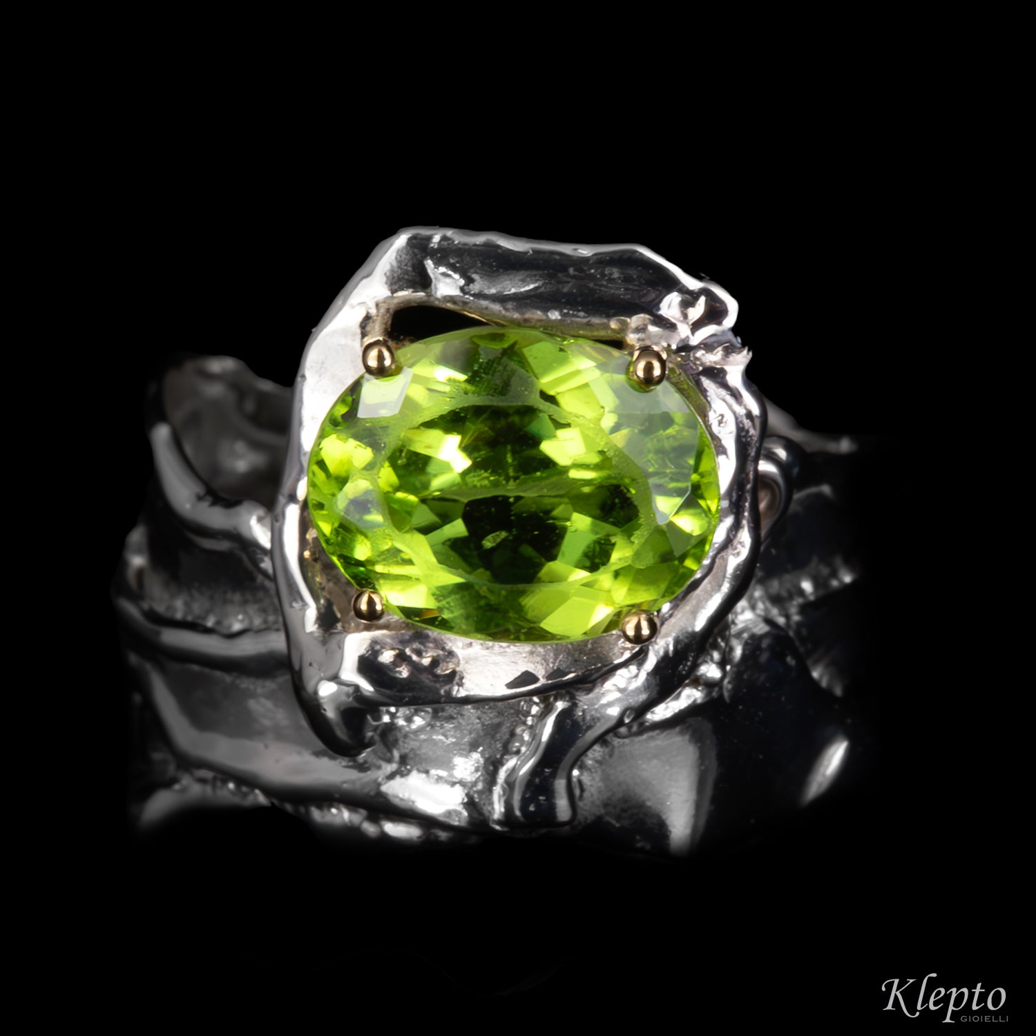 Silver Ring Silnova® with Peridot and yellow gold details