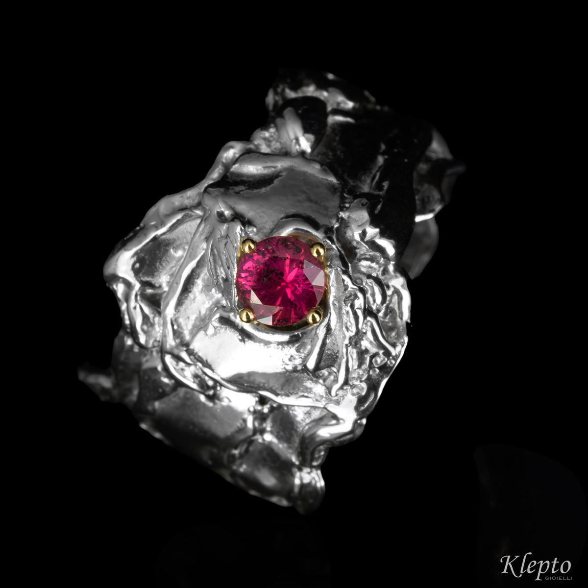 Silnova® silver ring with magenta sapphire and yellow gold details