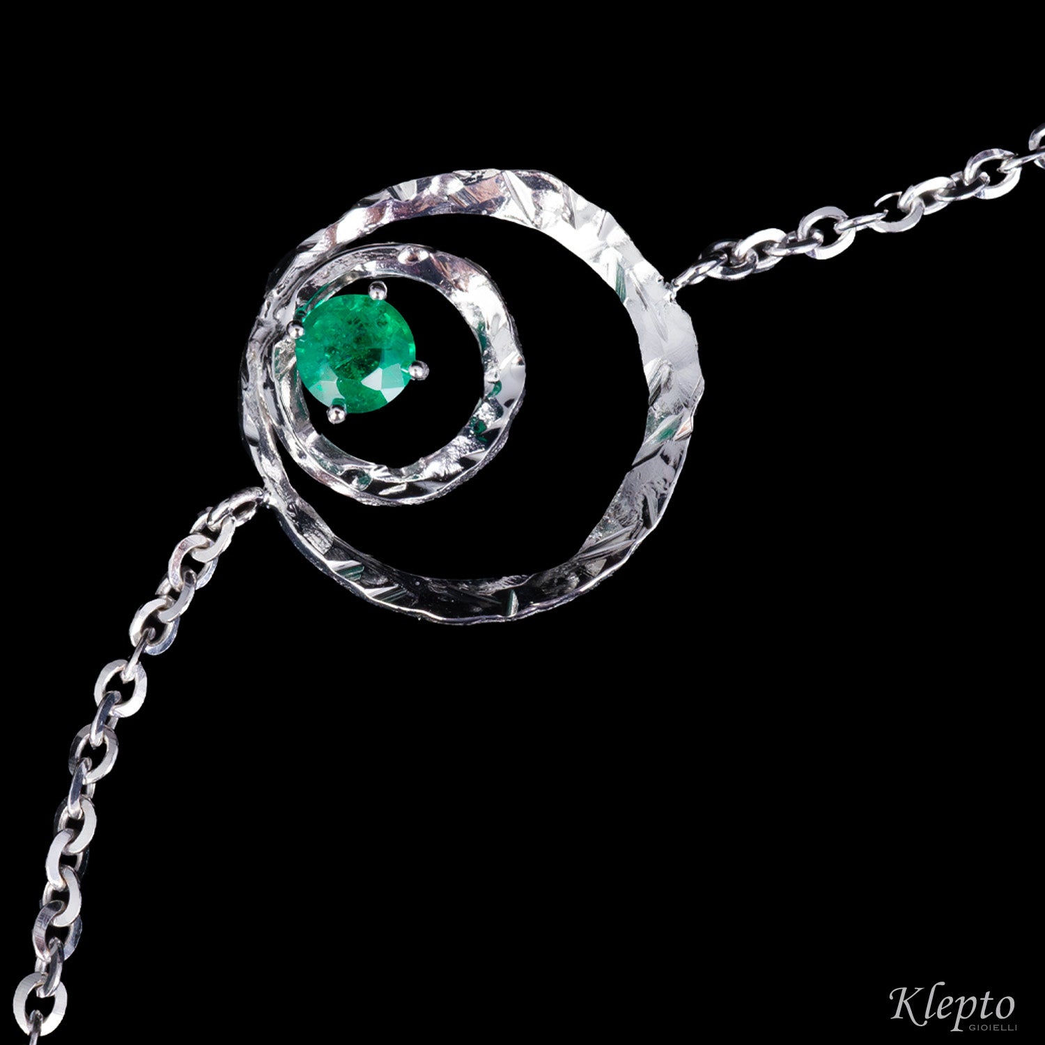 "Pulsar" white gold bracelet with Emerald