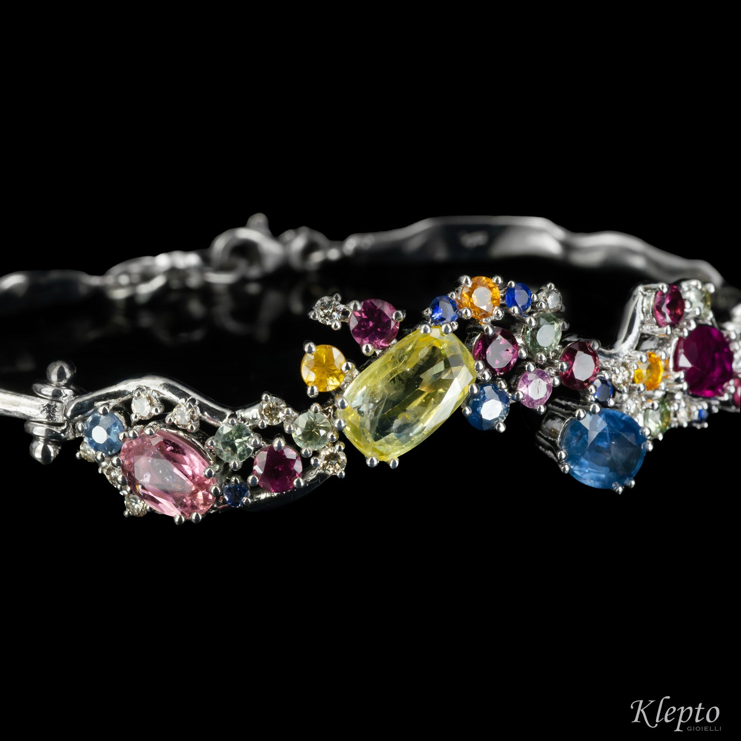 White gold bracelet with Sapphires, Rubies, Diamonds and Rhodolites