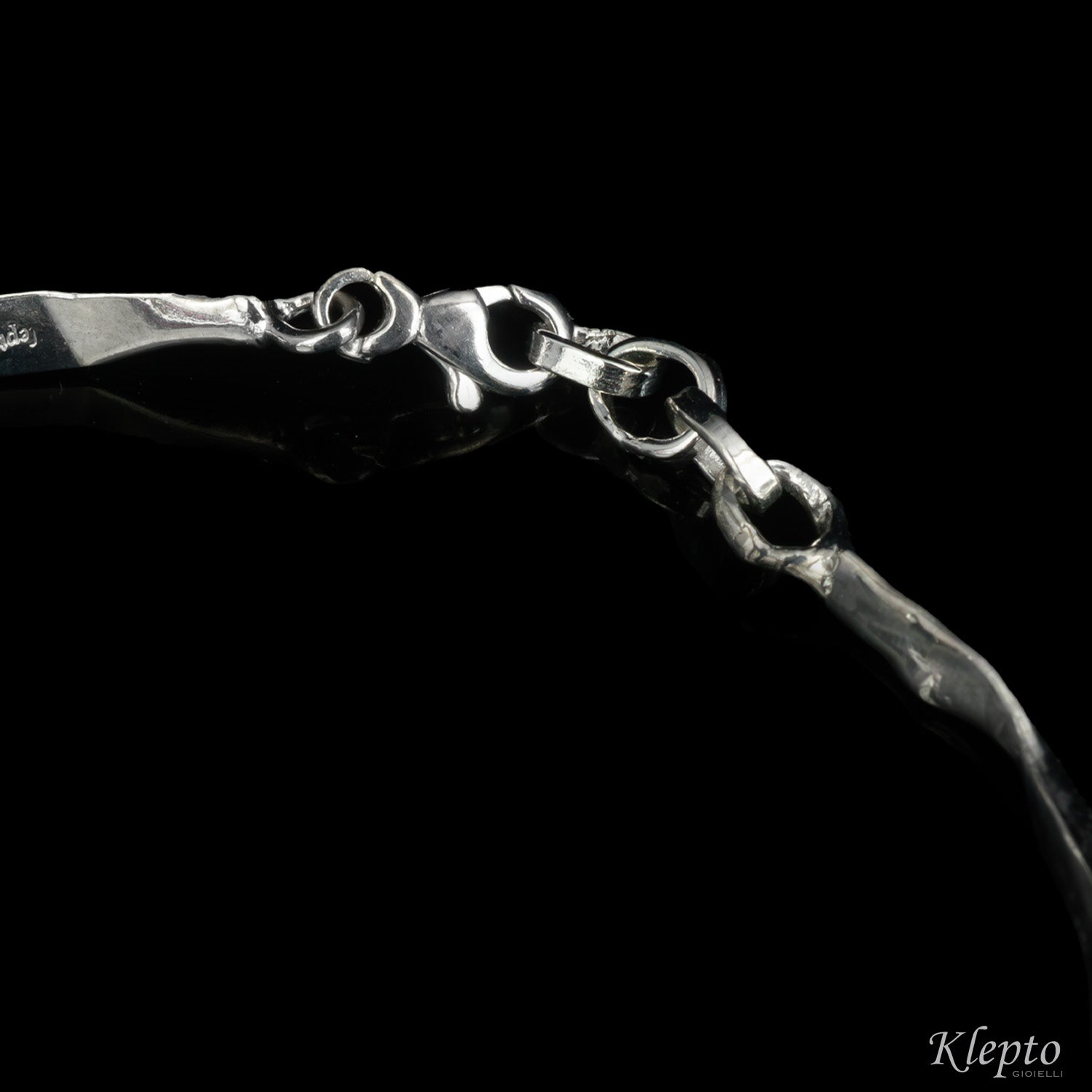 White gold bracelet with Sapphires, Rubies, Diamonds and Rhodolites