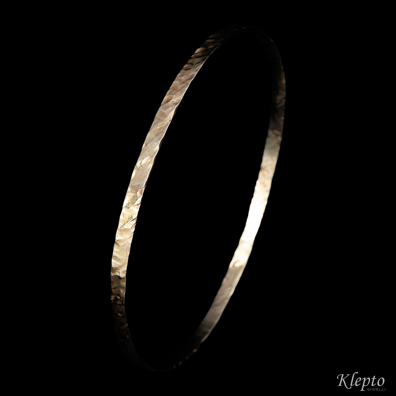 Rigid natural white gold bracelet