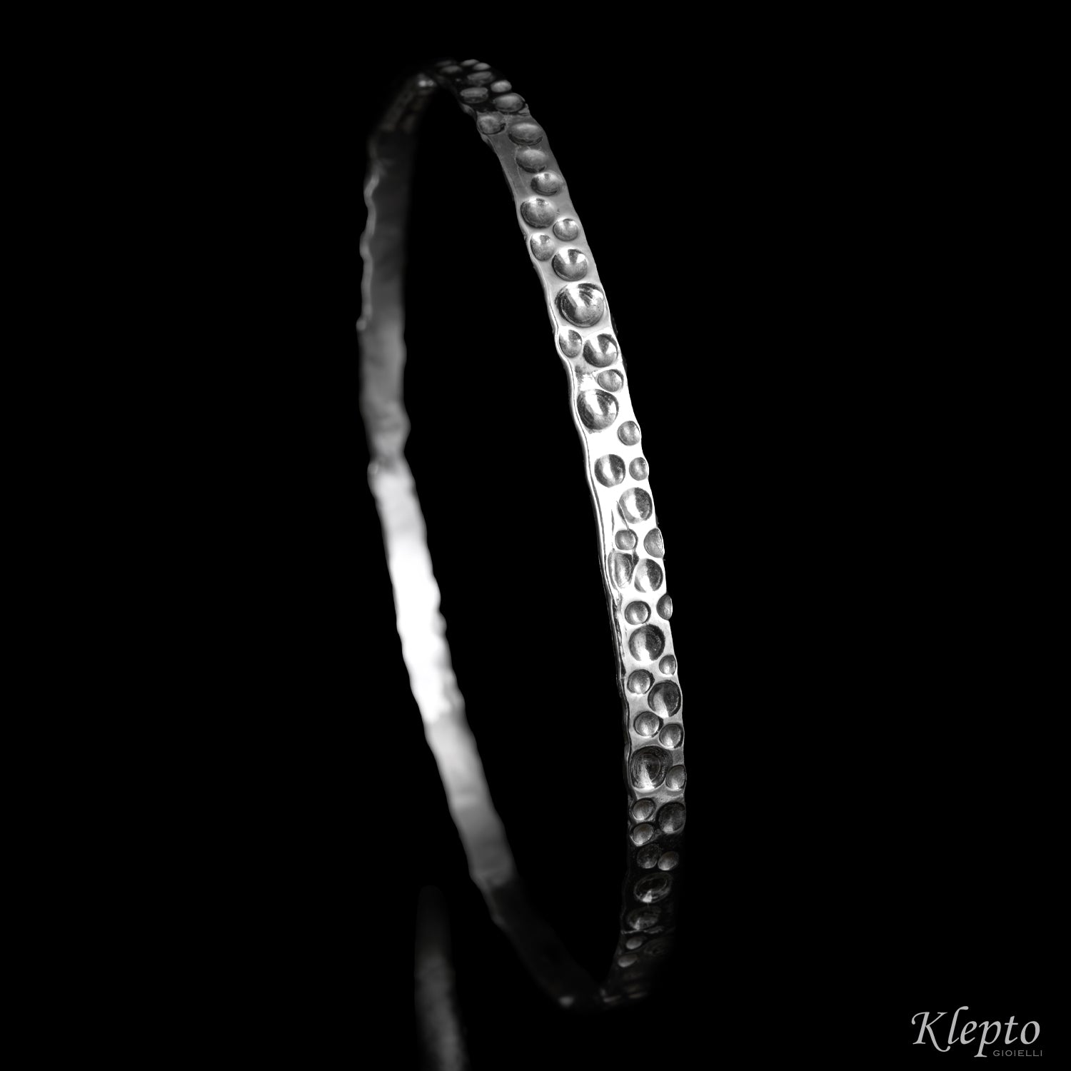 Small hammered rigid Silnova® silver bracelet