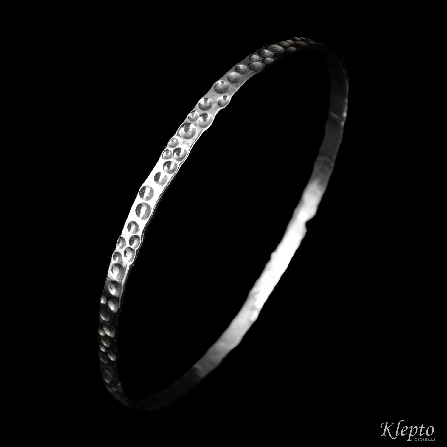 Small hammered rigid Silnova® silver bracelet