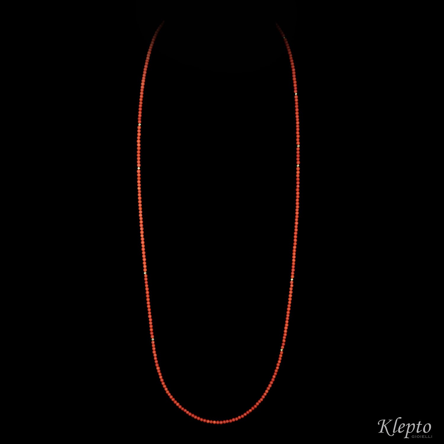 Long yellow gold necklace with coral