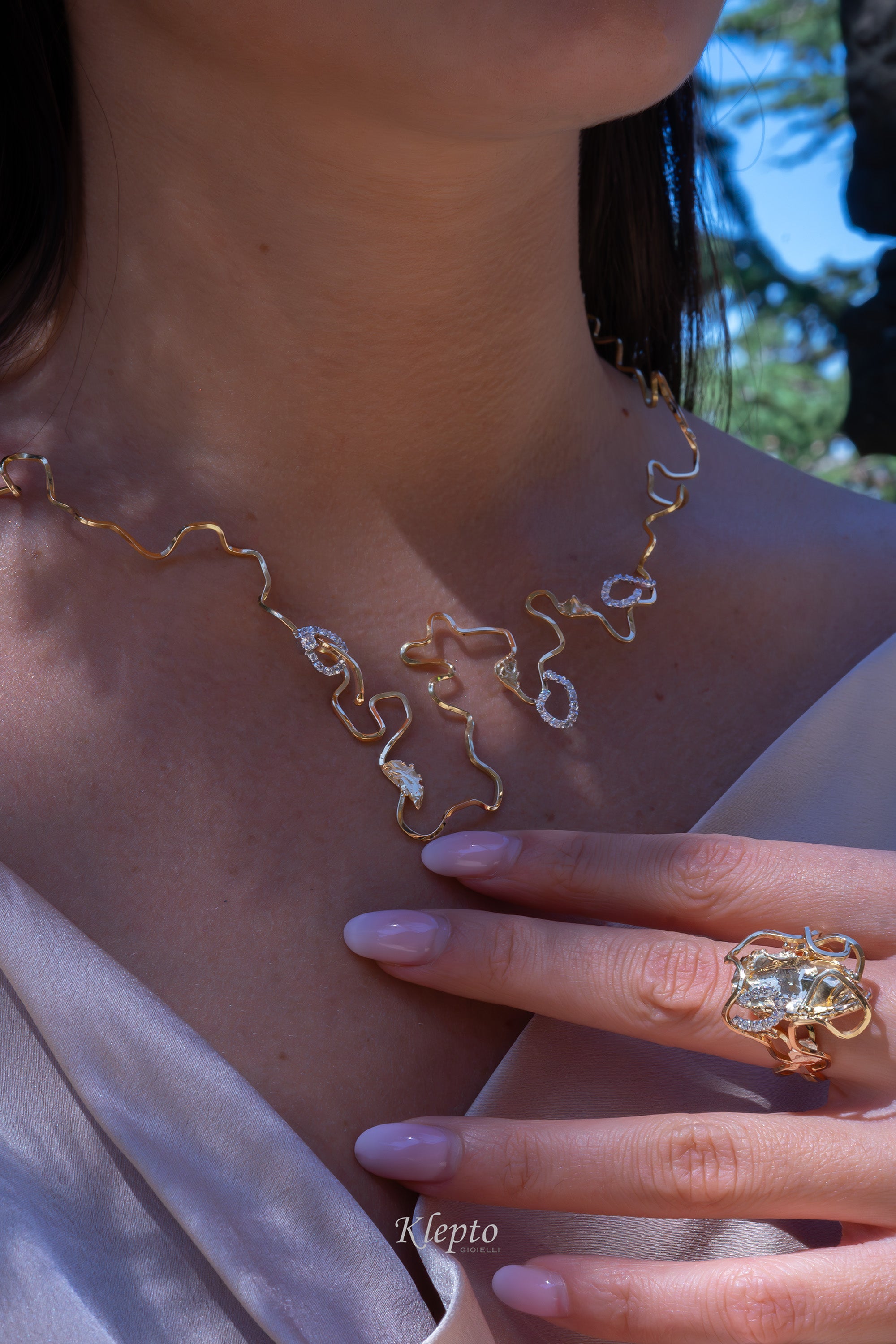 "EleKtro" yellow and white gold necklace with diamonds