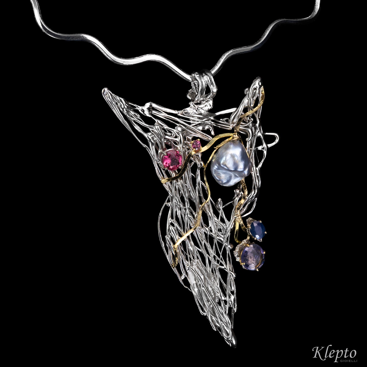 Silver necklace in Silnova® with Keshi pearl, sapphires, tourmaline, rhodolite, and yellow gold details.