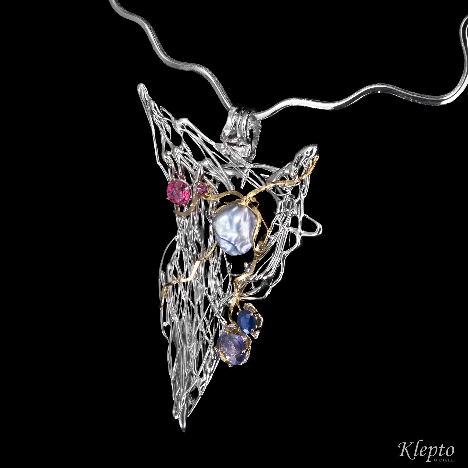 Silver necklace in Silnova® with Keshi pearl, sapphires, tourmaline, rhodolite, and yellow gold details.