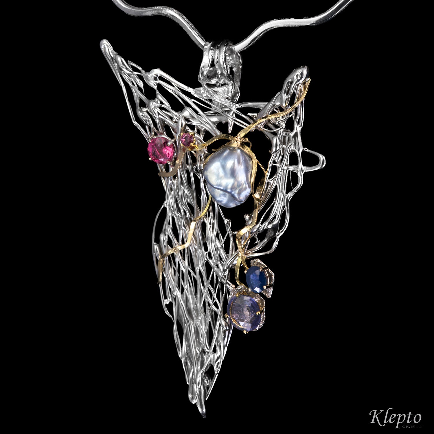 Silver necklace in Silnova® with Keshi pearl, sapphires, tourmaline, rhodolite, and yellow gold details.