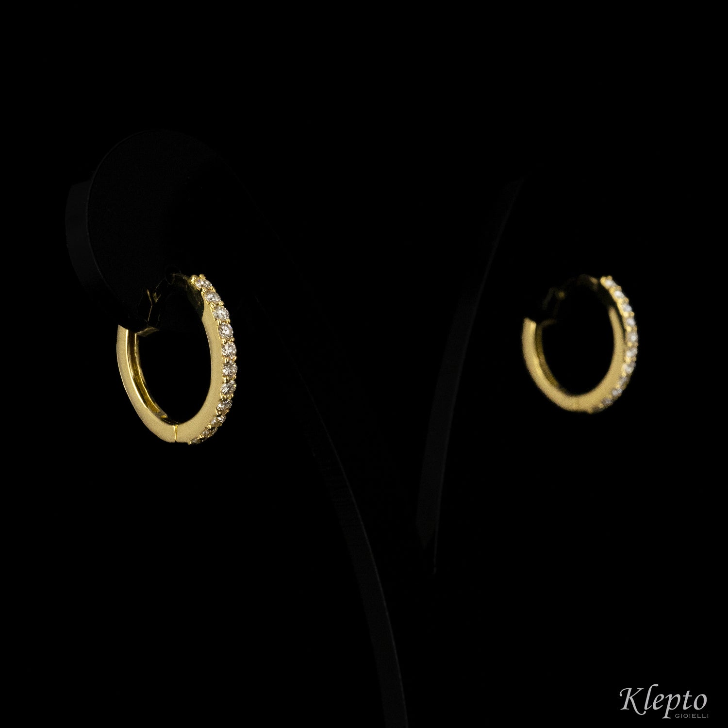 Yellow gold hoop earrings with diamonds