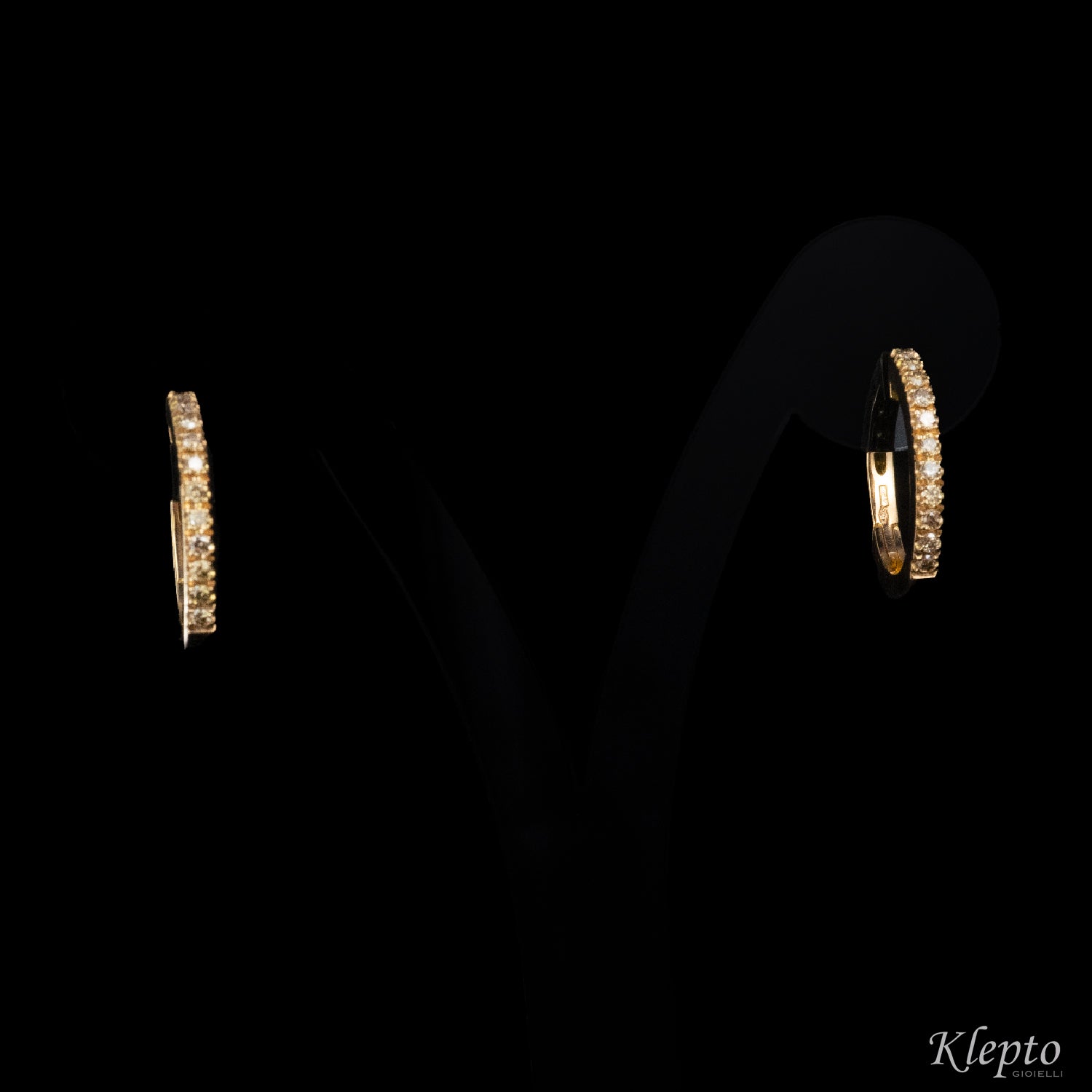 Rose gold hoop earrings with brown diamonds