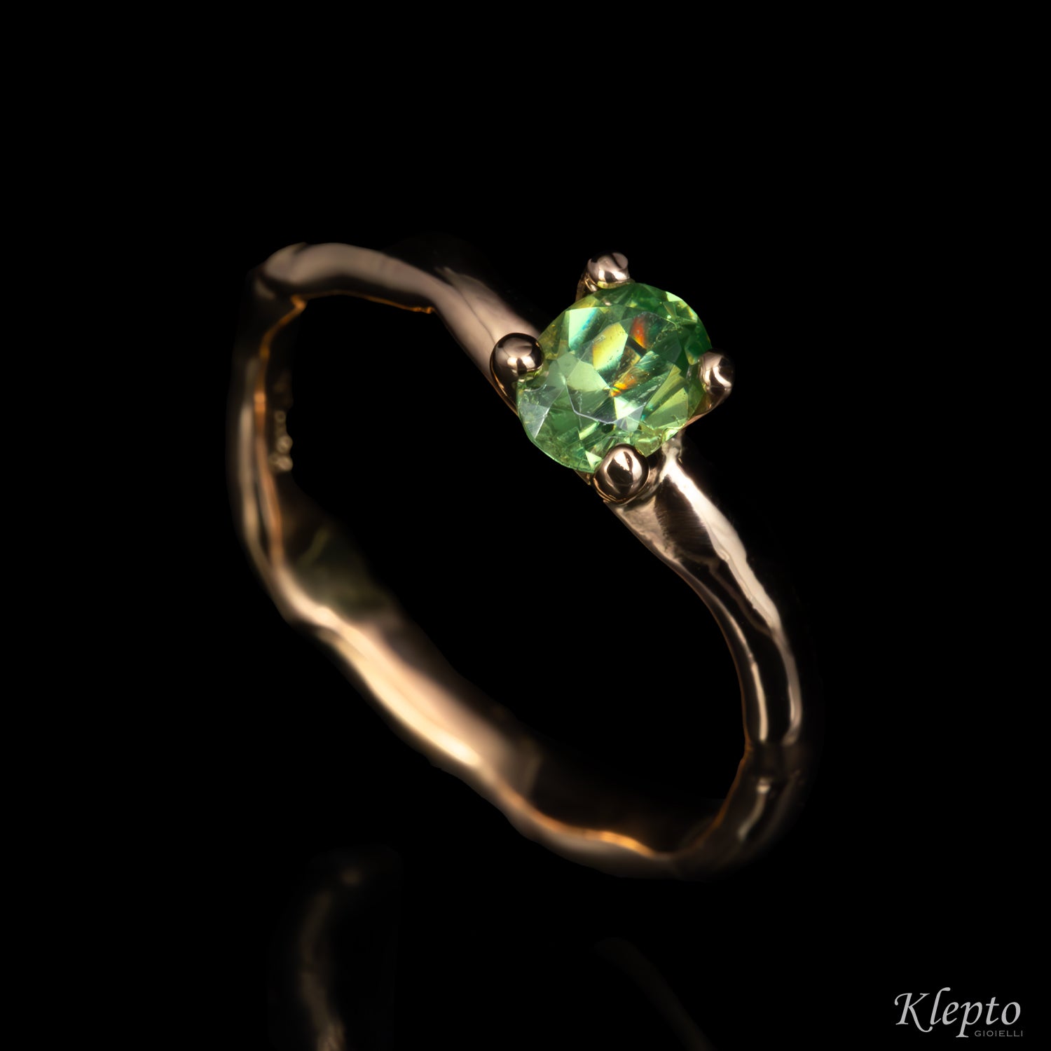 Rose gold ring "Divenire" with Demantoid