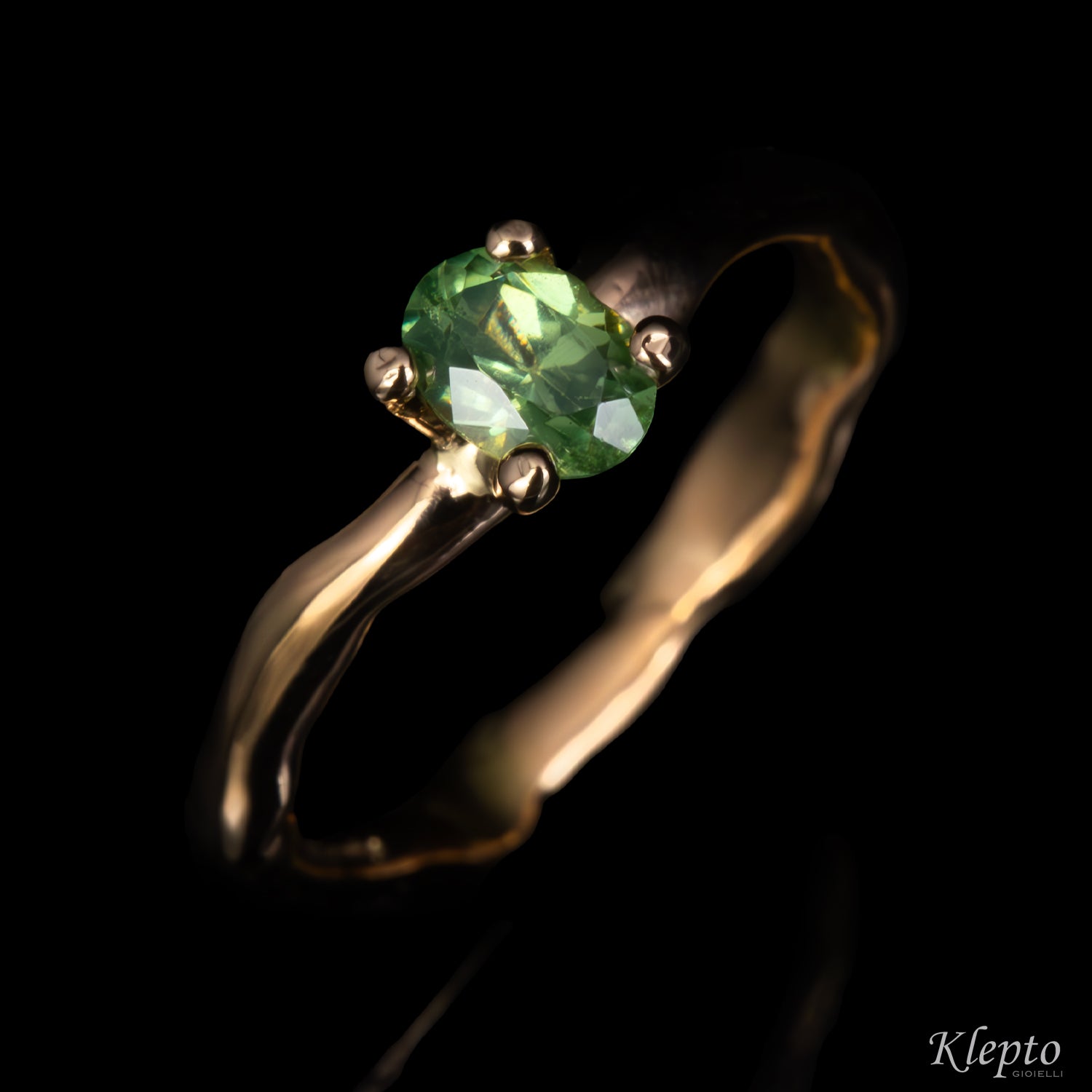 Rose gold ring "Divenire" with Demantoid