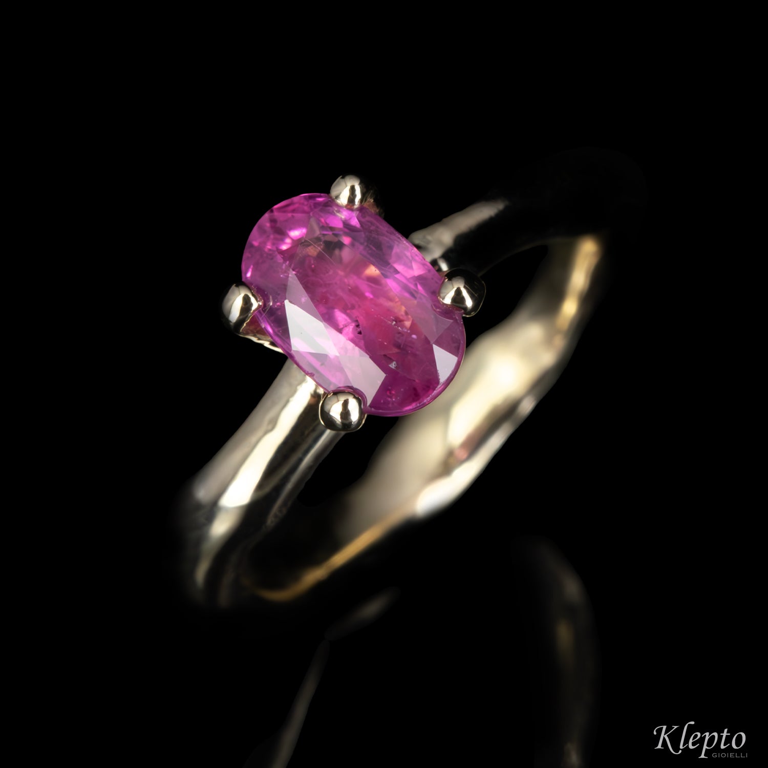 Natural white gold ring "Divenire" with pink sapphire