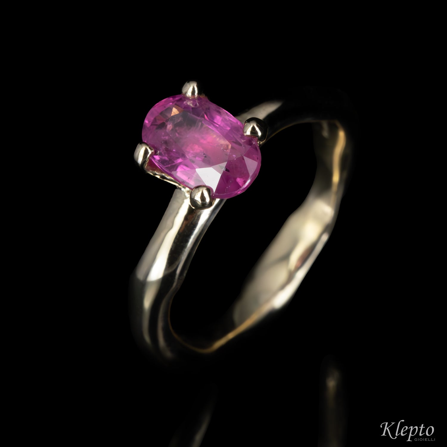 Natural white gold ring "Divenire" with pink sapphire