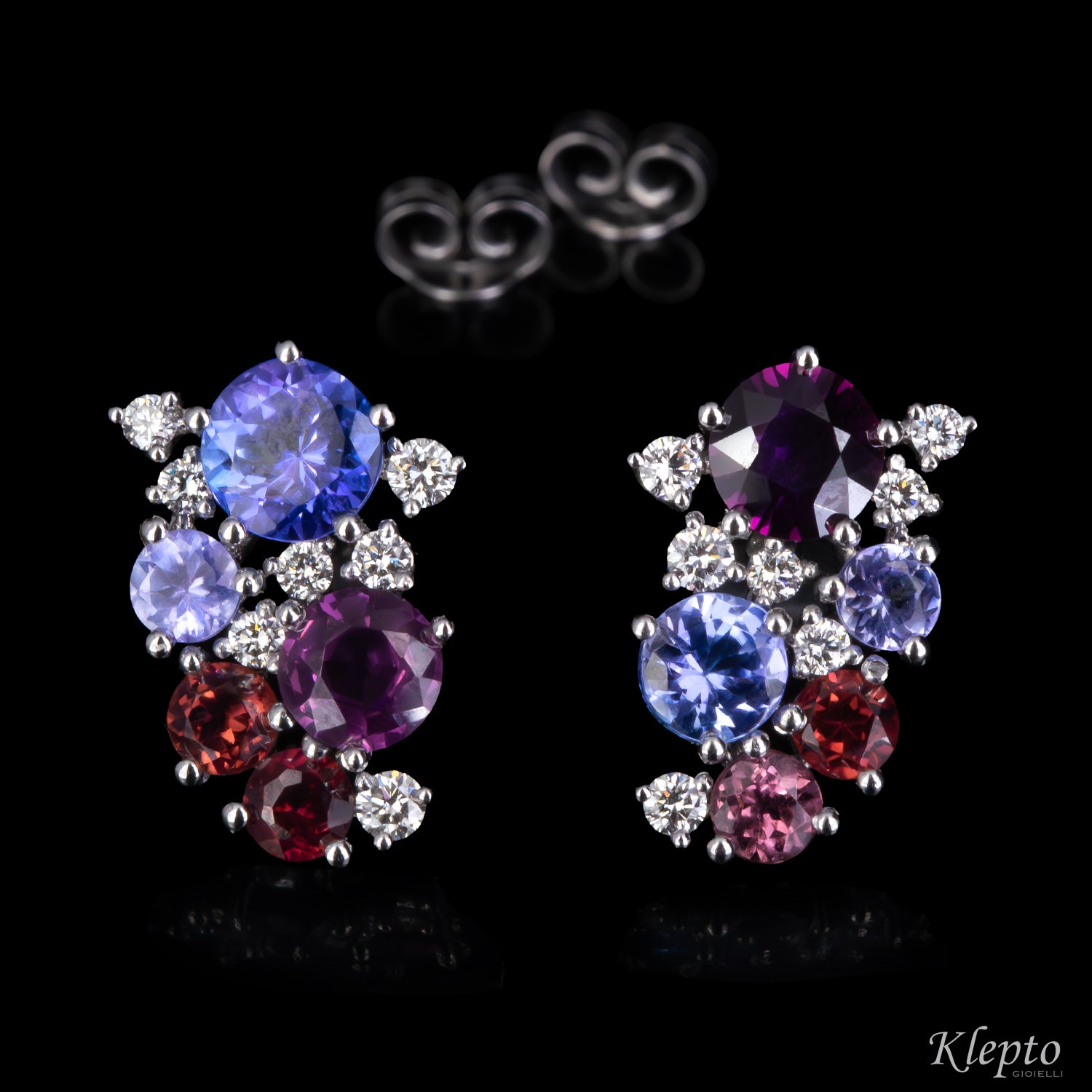 White gold earrings with Tanzanites, Sapphires, Rhodolites, and Diamonds