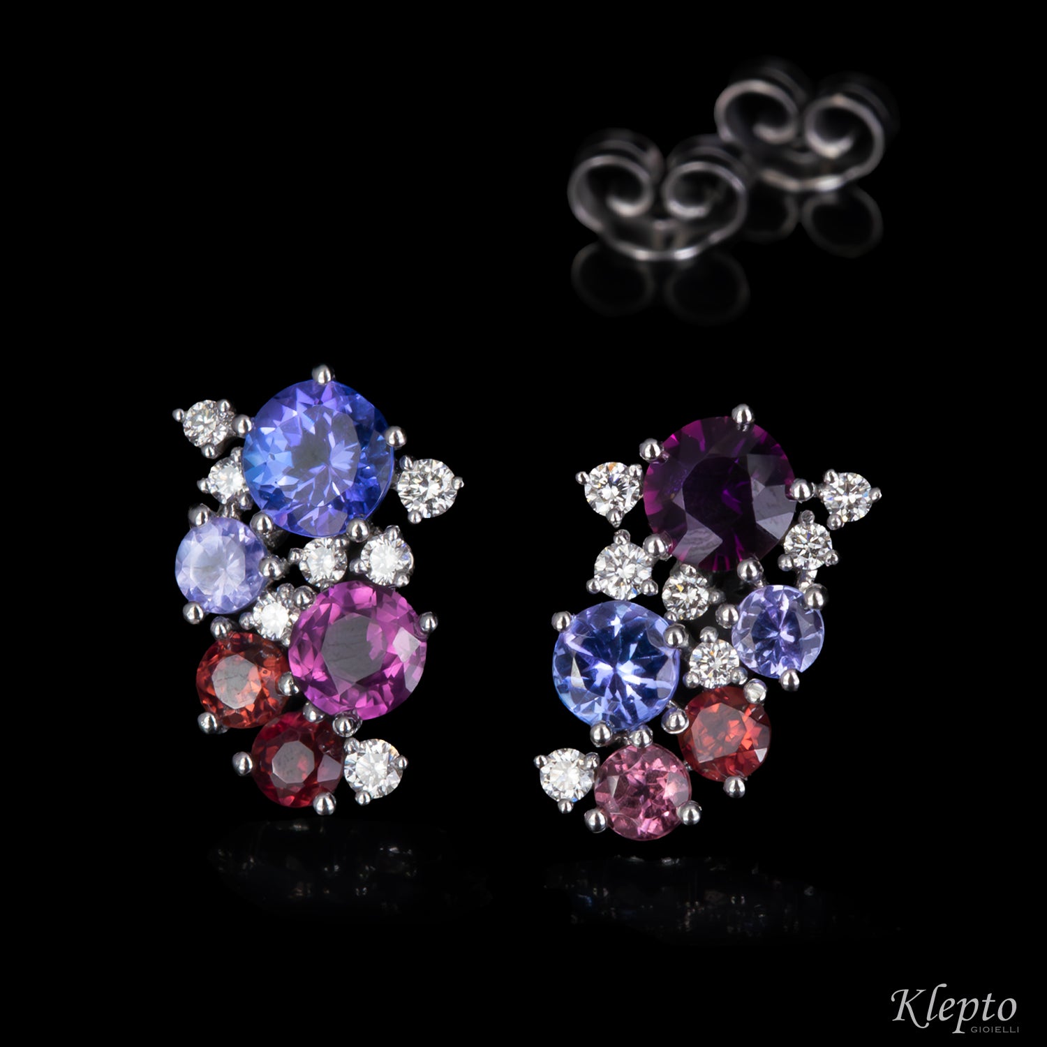 White gold earrings with Tanzanites, Sapphires, Rhodolites, and Diamonds