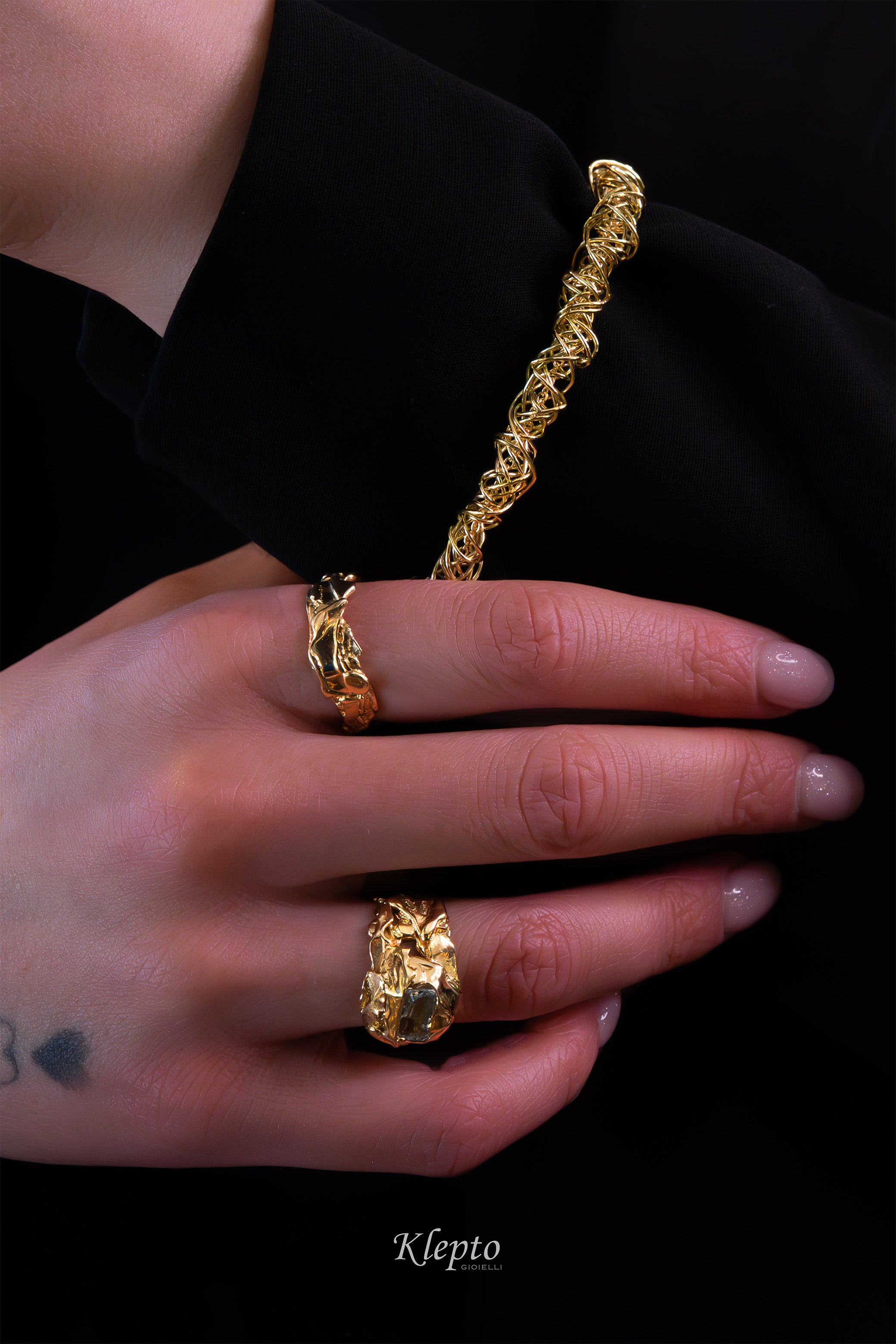 Yellow gold ring cast with flame with Aquamarine