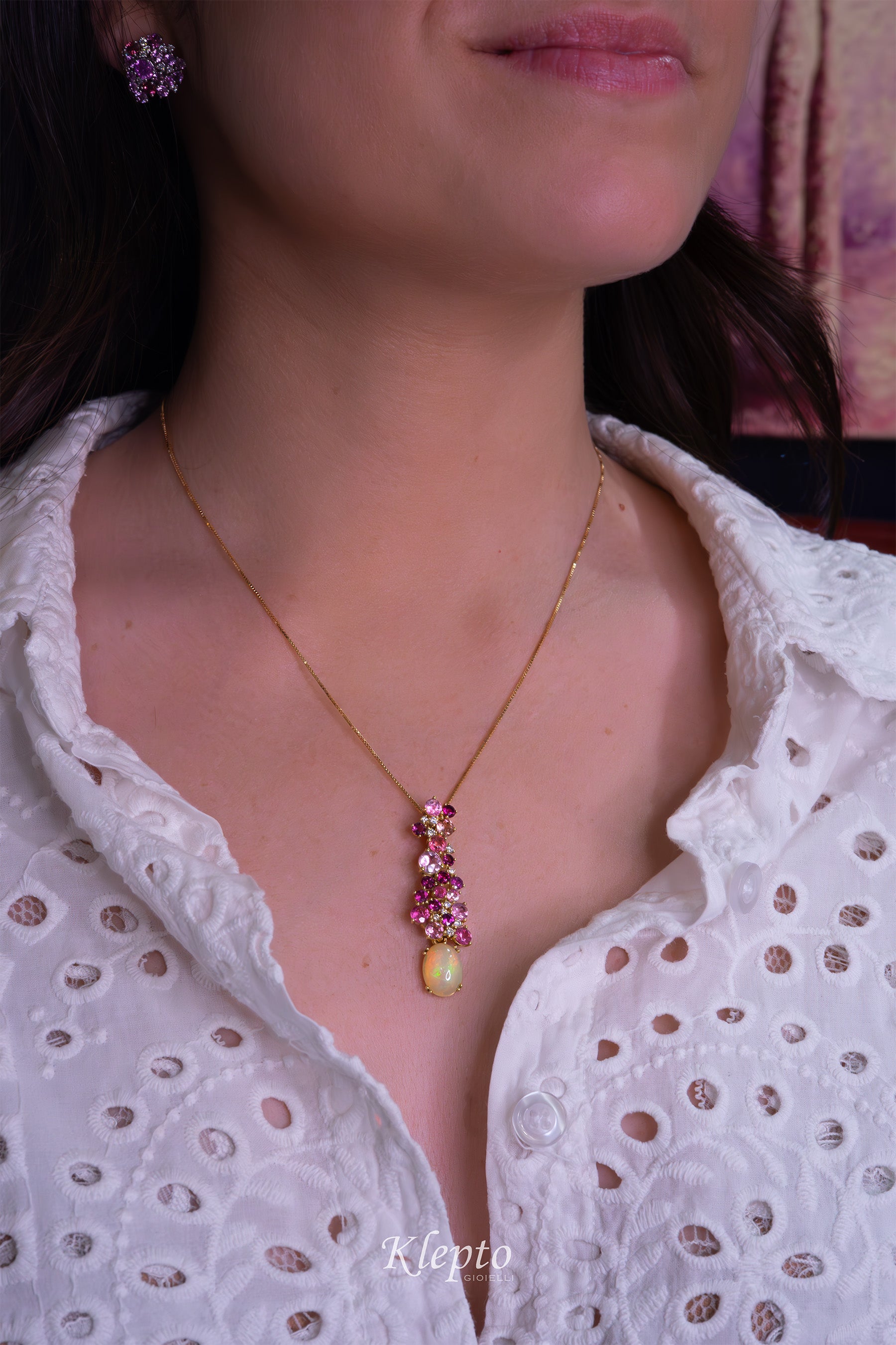 Yellow gold pendant with Tourmalines, Rhodolites, Opal and Diamonds.