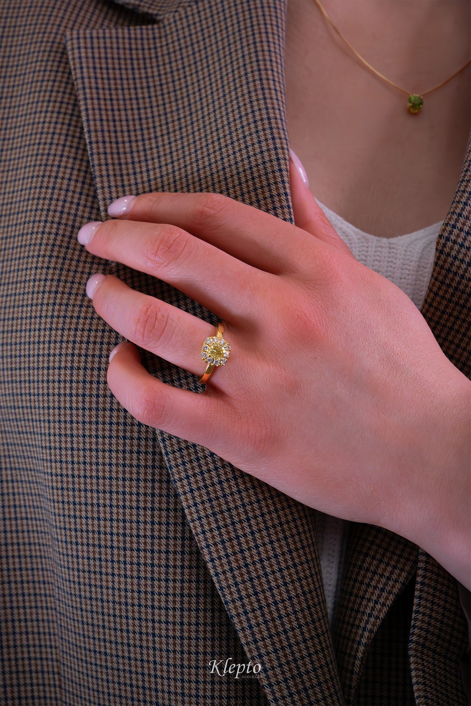Classic yellow gold ring with Fancy yellow Diamond and diamond halo