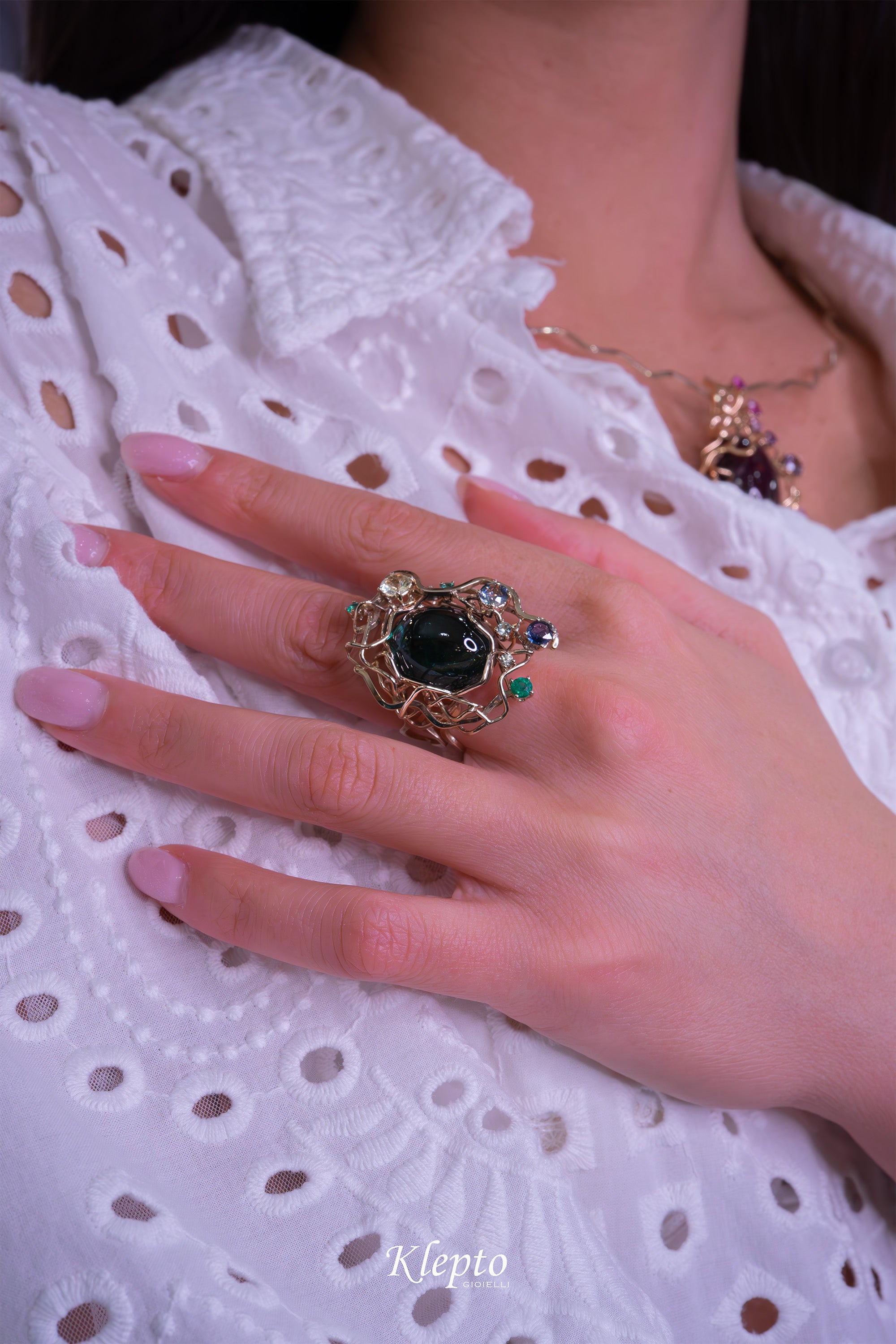 Natural white gold ring "Origini" with Tourmaline, Sapphires, and Emeralds