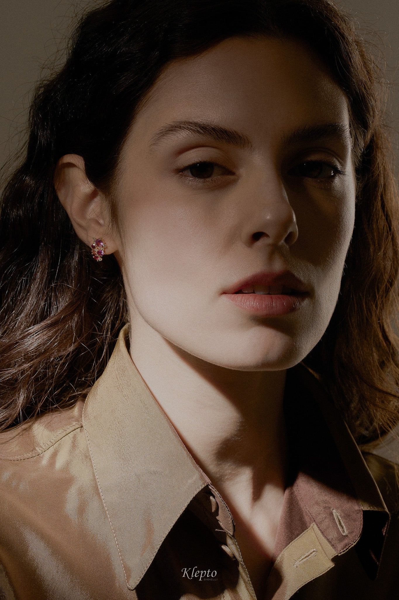 Rose and white gold earrings with pink sapphires, rhodolites, pink tourmalines, and diamonds