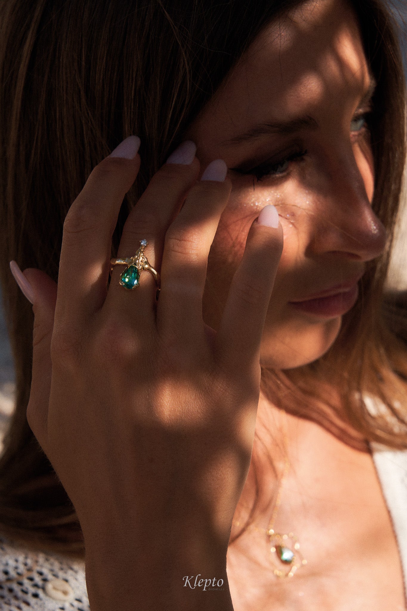Yellow gold ring with teardrop tourmaline and diamond