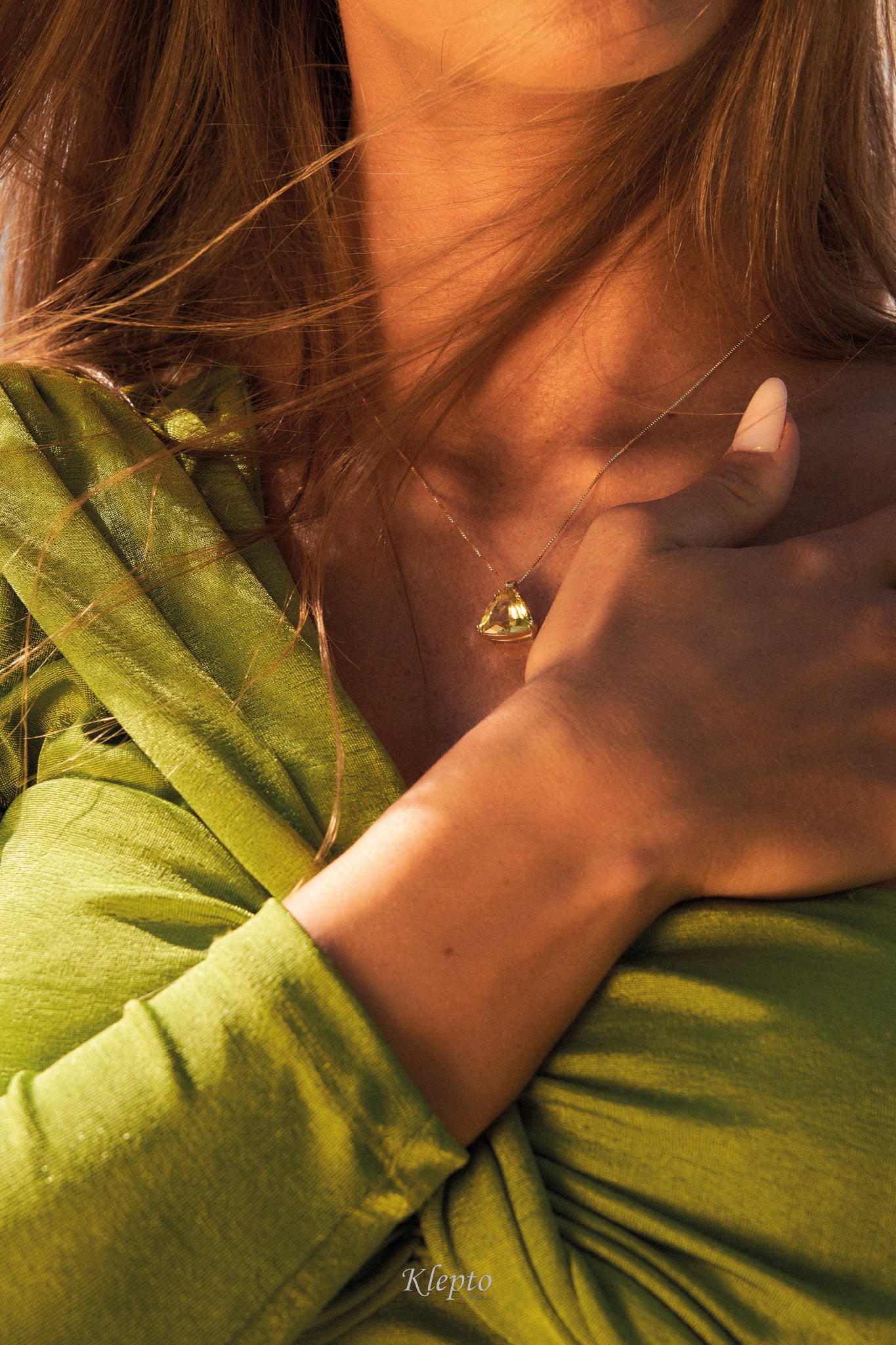 Yellow gold pendant with Heliodorus