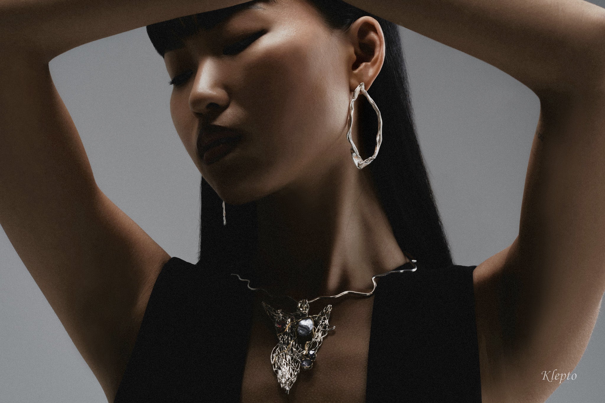 Silver necklace in Silnova® with Keshi pearl, sapphires, tourmaline, rhodolite, and yellow gold details.